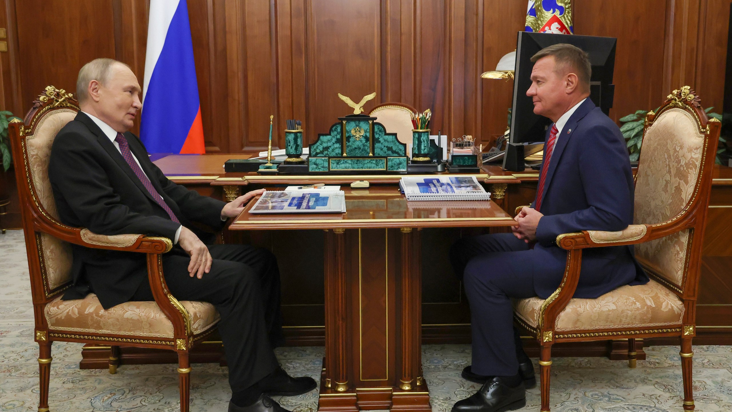 FILE - Russian President Vladimir Putin, left, meets with Russian Transport Minister Roman Starovoyt at the Kremlin in Moscow, Russia, Thursday, Jan. 30, 2025. (Gavriil Grigorov, Sputnik, Kremlin Pool Photo via AP, File)