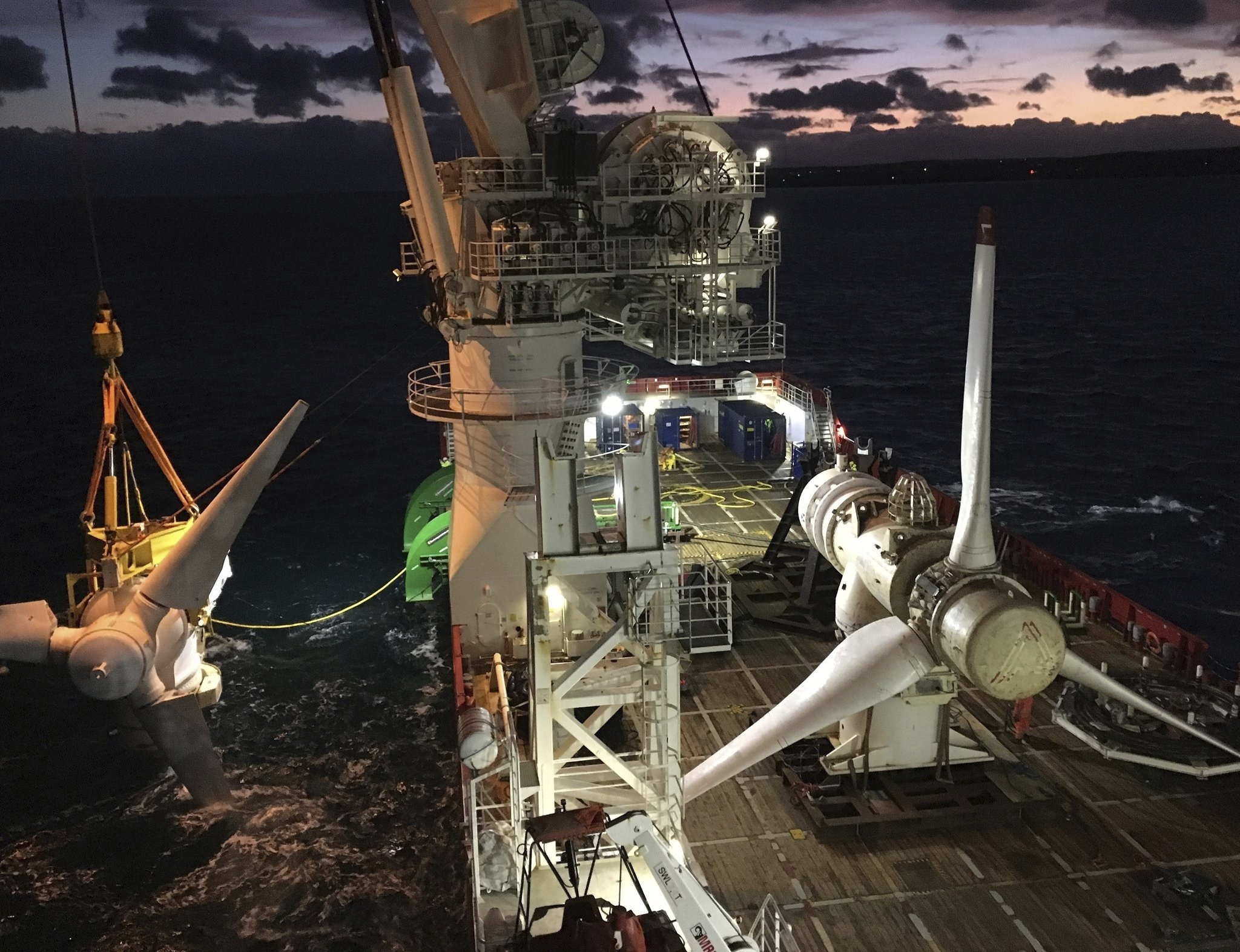 In this October 2018 photo provided by MeyGen, tidal turbines are visible at the MeyGen tidal site located in the Inner Sound of the Pentland Firth, a narrow channel of water between the Scottish mainland and Stroma Island. (Fraser Johnson/MeyGen, via AP)