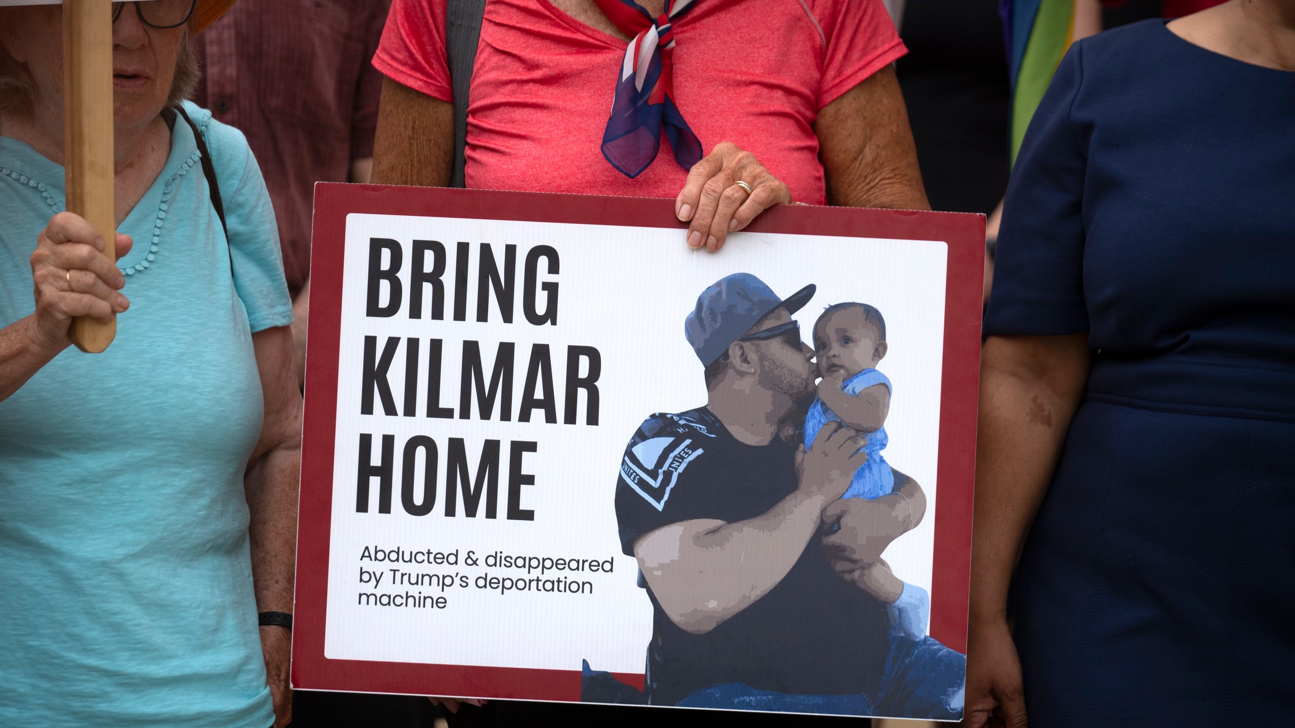 Supporters of Kilmar Abrego Garcia rally outside of the U.S. District Court in Greenbelt, Md., where a hearing was scheduled to be held on returning him to Maryland, Monday, July 7, 2025. (AP Photo/Mark Schiefelbein)