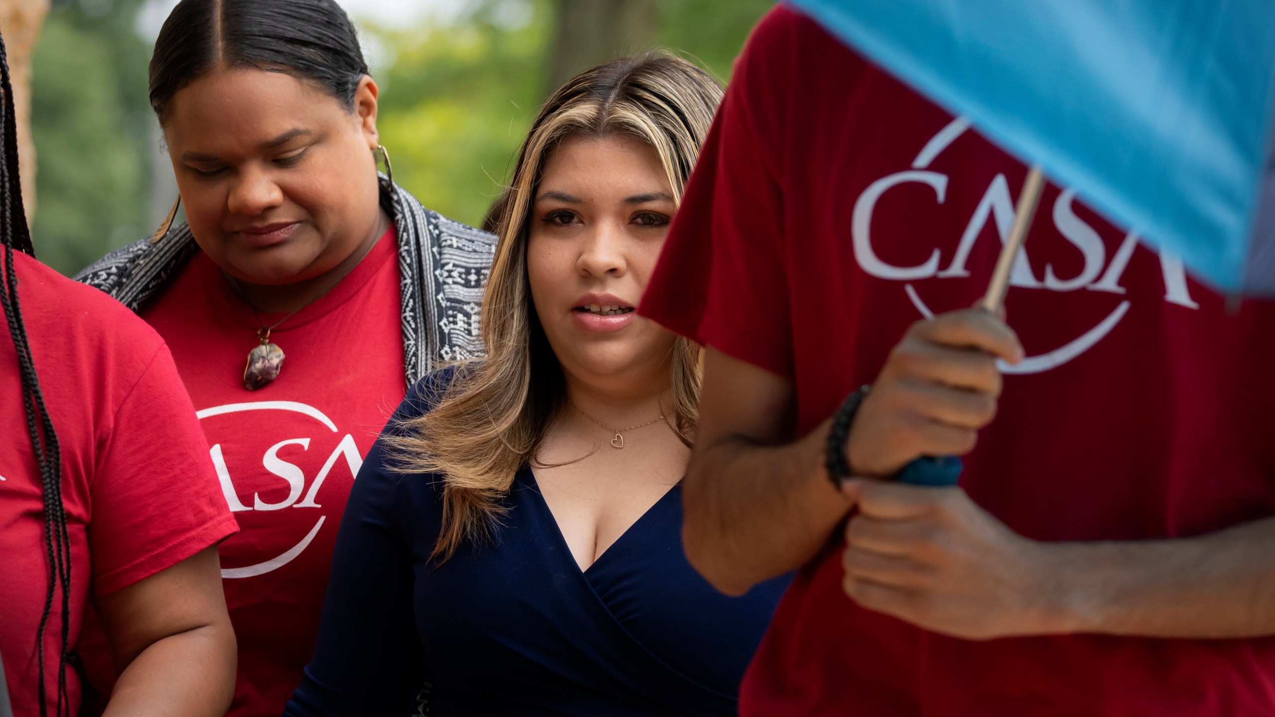 Jennifer Vasquez Sura, center, the wife of Kilmar Abrego Garcia, arrives at the U.S. District Court in Greenbelt, Md., Monday, July 7, 2025. (AP Photo/Mark Schiefelbein)