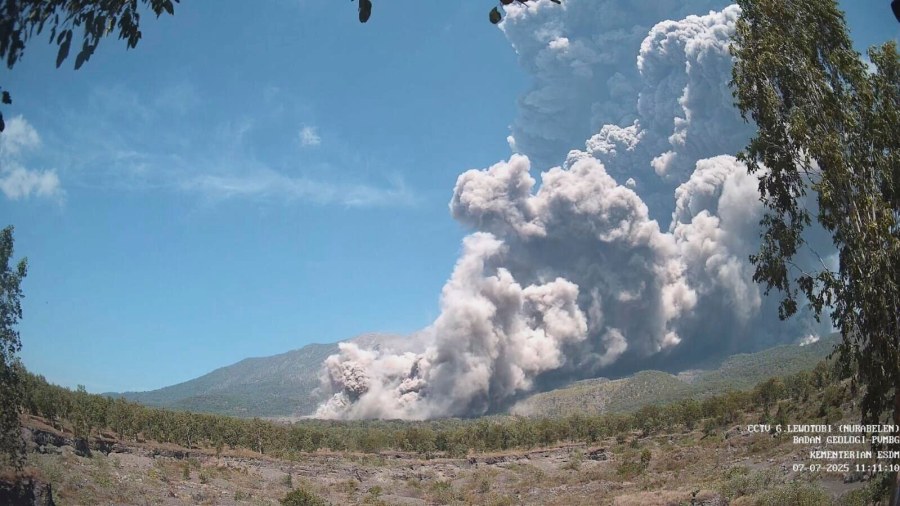 ADDS DETAILS OF THE DIGITAL IMPRINTS AT LOWER RIGHT - In photo released by the Geological Agency (Badan Geologi) of the Indonesia's Ministry of Energy and Mineral Resources, Mount Lewotobi Laki Laki spews volcanic materials during an eruption in East Flores, Indonesia, Monday, July 7, 2025. The watermark at the lower right corner reads: CCTV Mount Lewotobi, Geological Agency, Ministry of Energy and Mineral Resources, with the date and time. (Badan Geologi via AP)