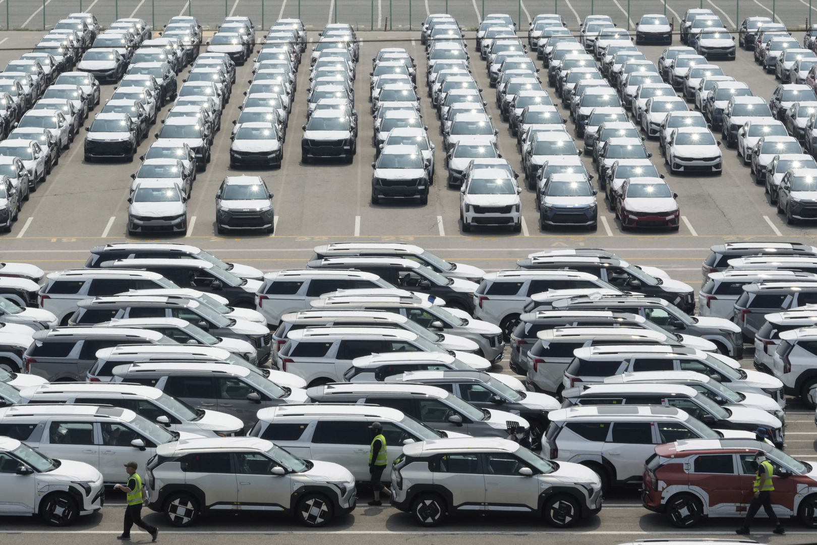 Vehicles for export are parked at a port in Pyeongtaek, South Korea, Tuesday, July 8, 2025. (AP Photo/Ahn Young-joon)