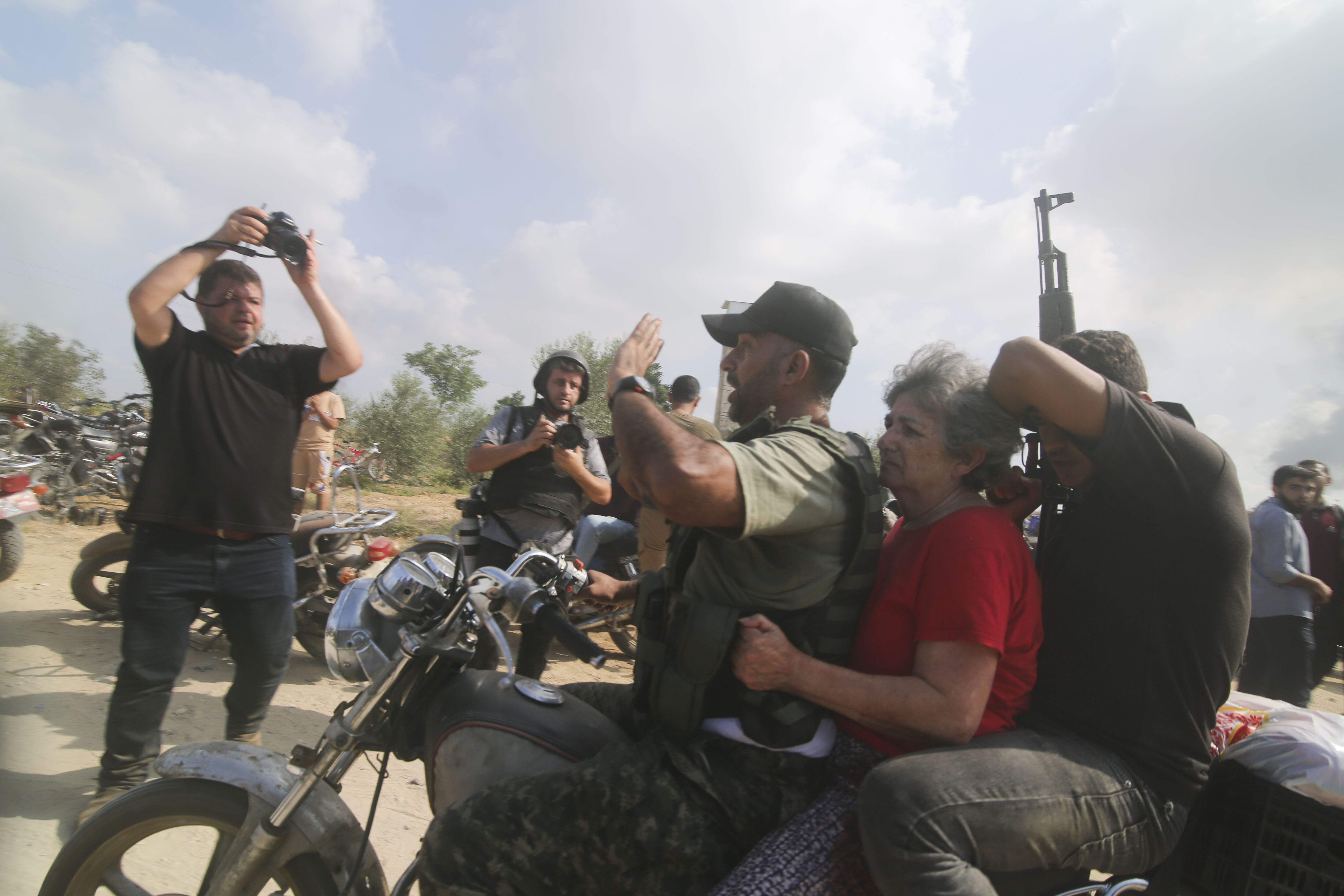 FILE -Hamas militants transport Adina Moshe, 72, inside the Gaza Strip after kidnapping her from her home in Nir Oz, a kibbutz in Israel near the Gaza border, on Oct. 7, 2023. (AP Photo), File)
