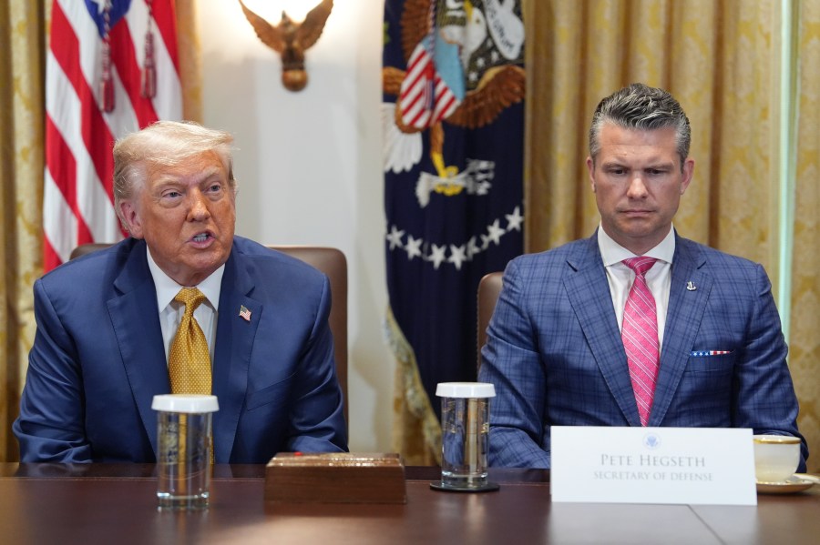 President Donald Trump, left, with Defense Secretary Pete Hegseth, right, during a cabinet meeting at the White House, Tuesday, July 8, 2025, in Washington. (AP Photo/Evan Vucci)