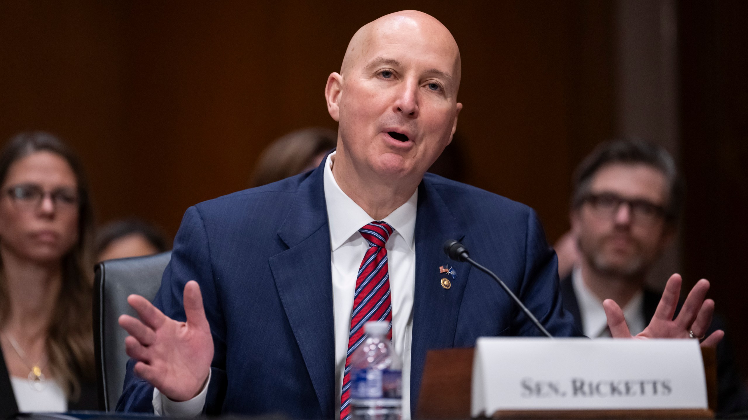 FILE - Sen. Pete Ricketts, R-Neb., introduces Dr. Jay Bhattacharya during his confirmation hearing at Capitol Hill in Washington, March 5, 2025. (AP Photo/Ben Curtis, File)