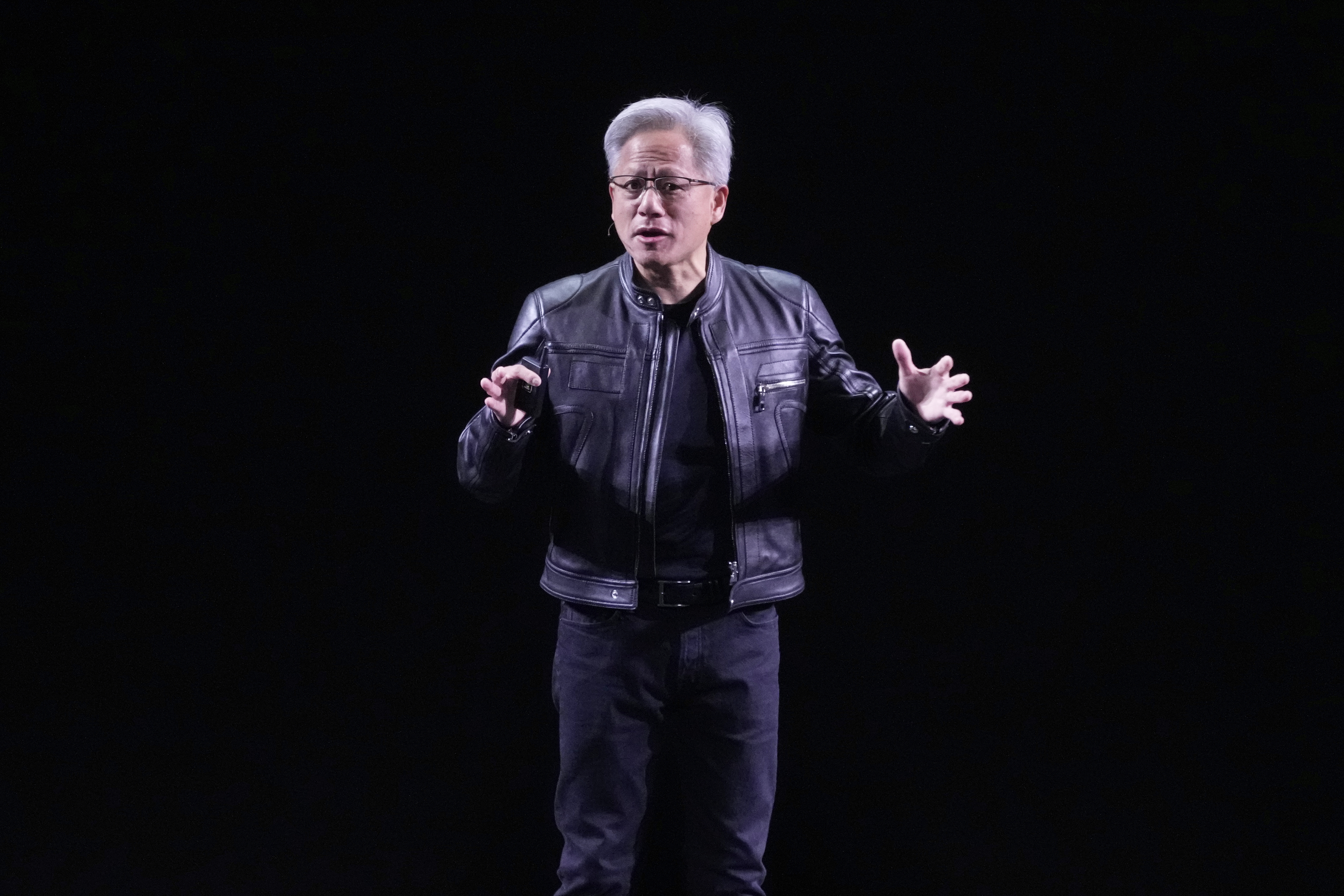 NVIDIA CEO Jensen Huang delivers his keynote address Wednesday, June 11, 2025 at the Vivatech fair in Paris. (AP Photo/Michel Euler)