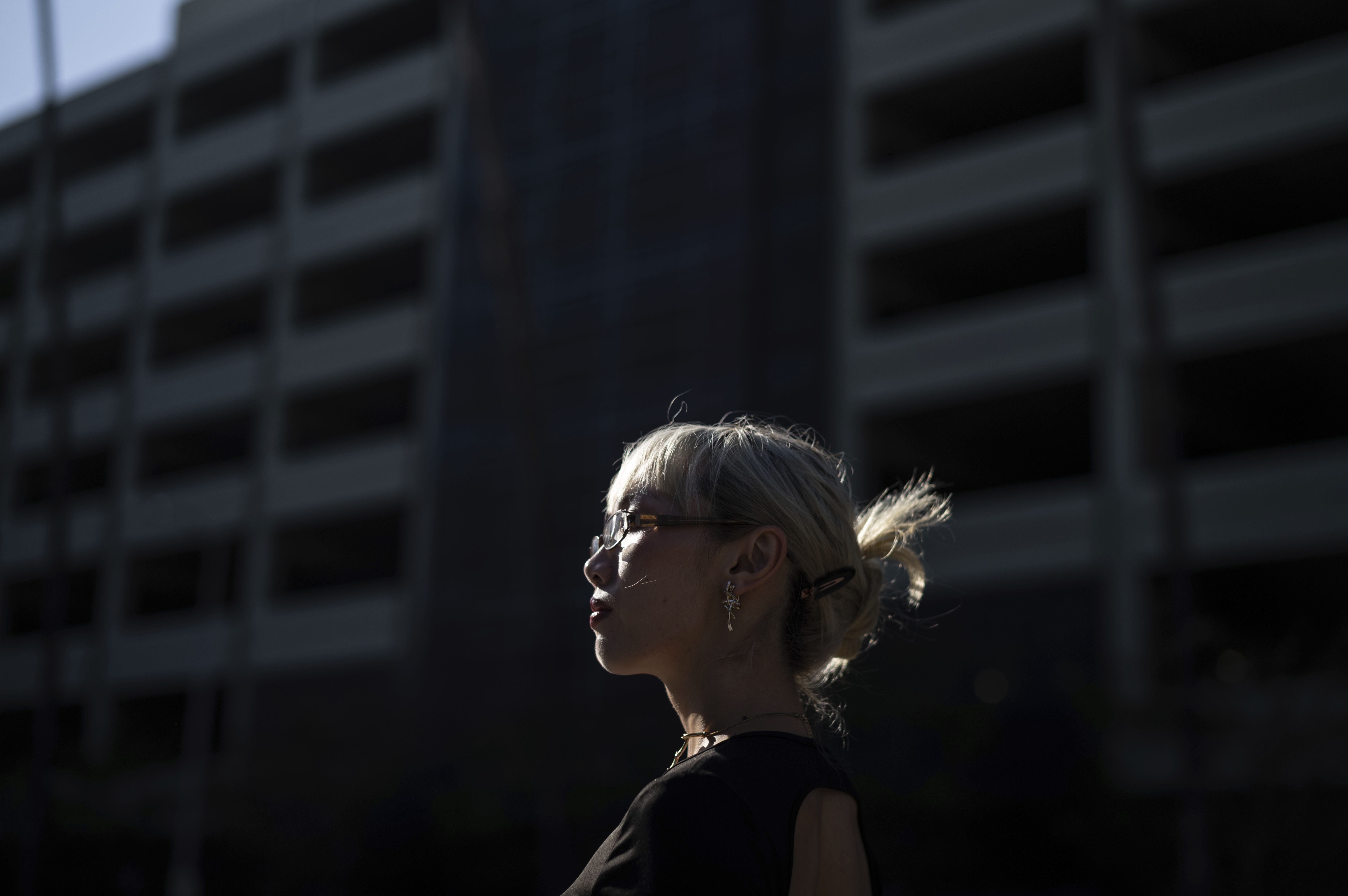 Maria Do, community mobilization manager at the Los Angeles LGBT Center, stands for a photo outside Children's Hospital Los Angeles before a protest against the closure of the hospital's trans youth clinic Thursday, July 3, 2025, in Los Angeles. (AP Photo/Jae C. Hong)
