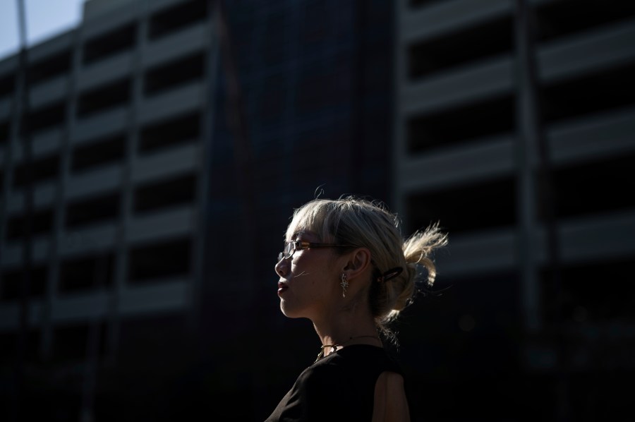 Maria Do, community mobilization manager at the Los Angeles LGBT Center, stands for a photo outside Children's Hospital Los Angeles before a protest against the closure of the hospital's trans youth clinic Thursday, July 3, 2025, in Los Angeles. (AP Photo/Jae C. Hong)