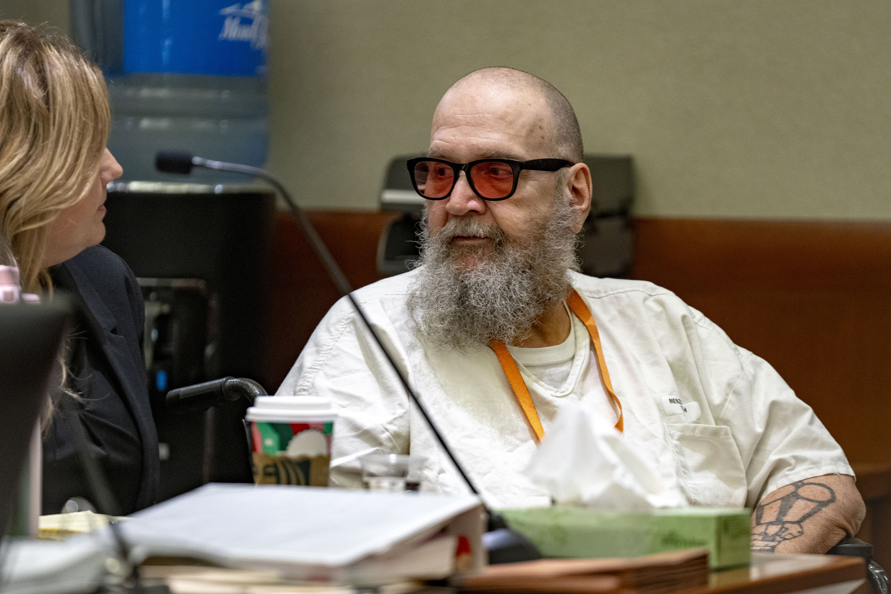 FILE - Jasmine North, federal public defender mitigation investigator, speaks with Ralph Leroy Menzies during his competency hearing in Third District Court in West Jordan, Utah, Nov. 18, 2024. (Rick Egan/The Salt Lake Tribune via AP, Pool, File)