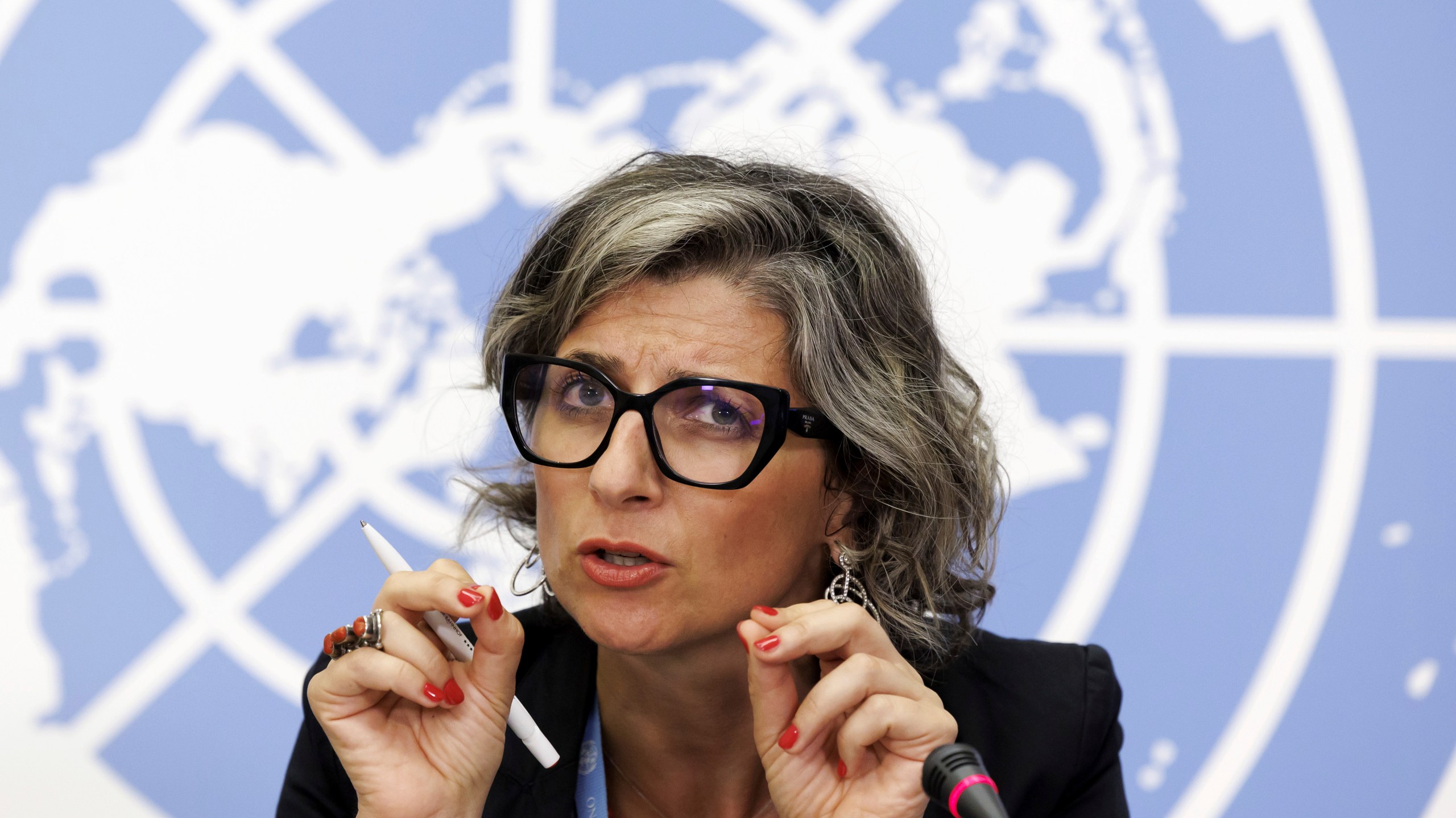 FILE - Francesca Albanese, Special Rapporteur on the situation of human rights in the Palestinian territories occupied since 1967, talks to the media during a press conference at the European headquarters of the United Nations in Geneva, Switzerland, July 11, 2023. (Salvatore Di Nolfi/Keystone via AP, File)
