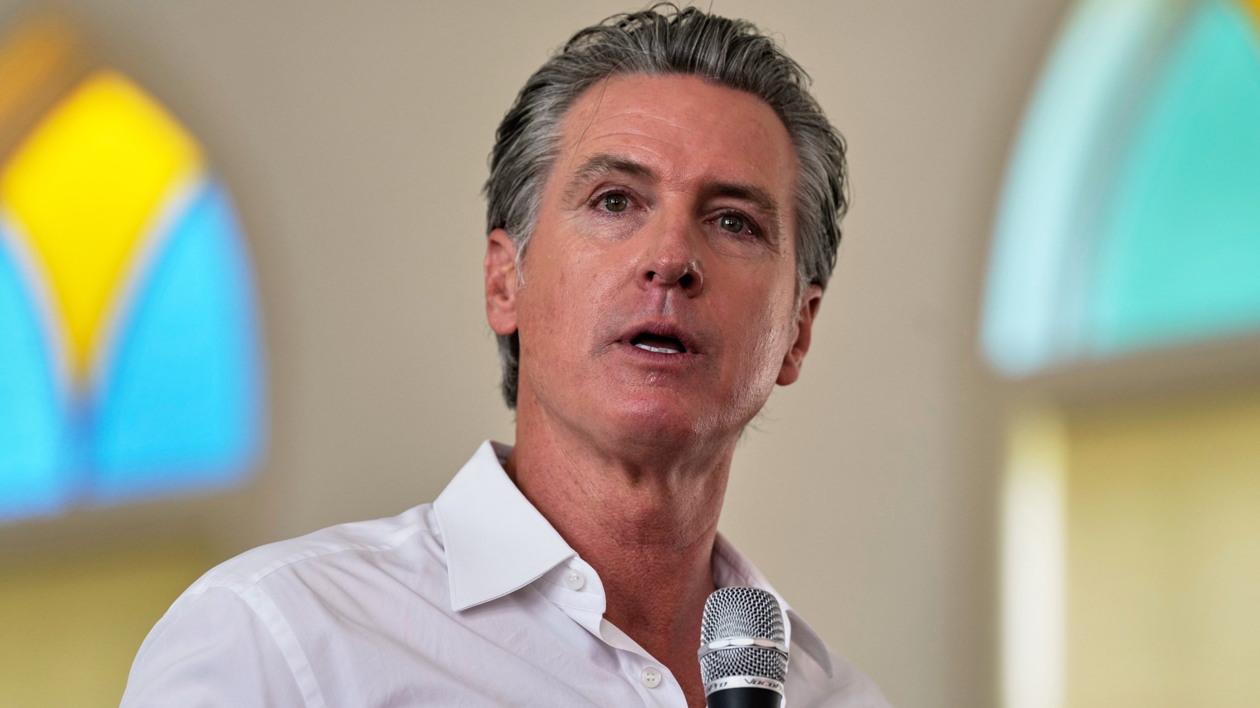 Gov. Gavin Newsom, D-Calif., gives remarks to a crowd at St. Paul First Baptist Church on Wednesday, July 9, 2025, in Laurens, S.C. (AP Photo/Meg Kinnard)