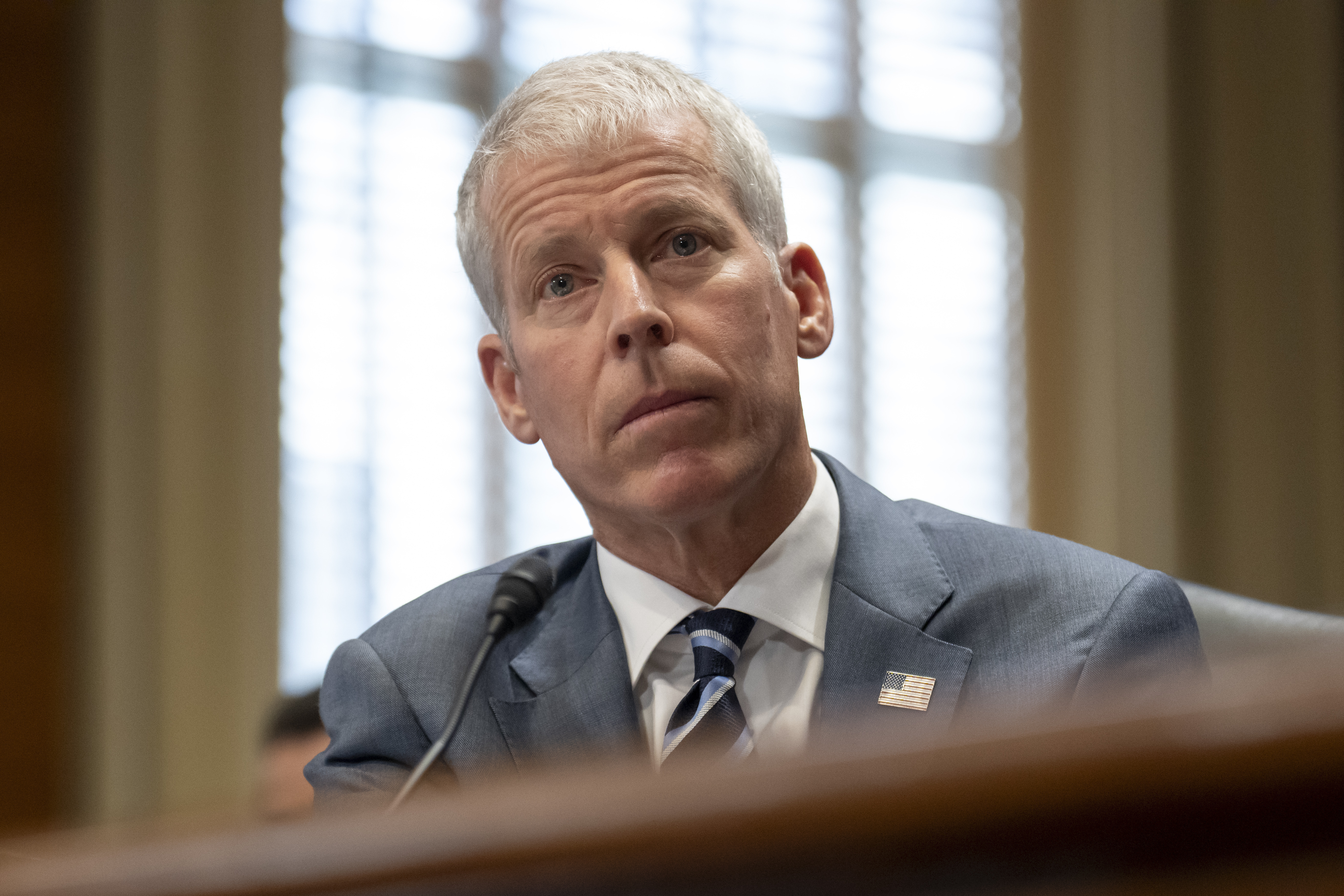 FILE - Energy Secretary Chris Wright listens during a hearing of the Senate Committee on Energy and Natural Resources on Capitol Hill, June 18, 2025, in Washington. (AP Photo/Mark Schiefelbein, File)