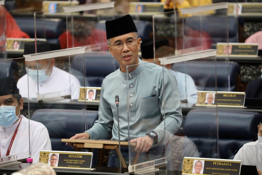 FILE - Malaysia's Finance Minister Zafrul Aziz delivers the 2021 budget speech at parliament in Kuala Lumpur, Malaysia, Nov. 6, 2020. (AP Photo/Vincent Thian, File)