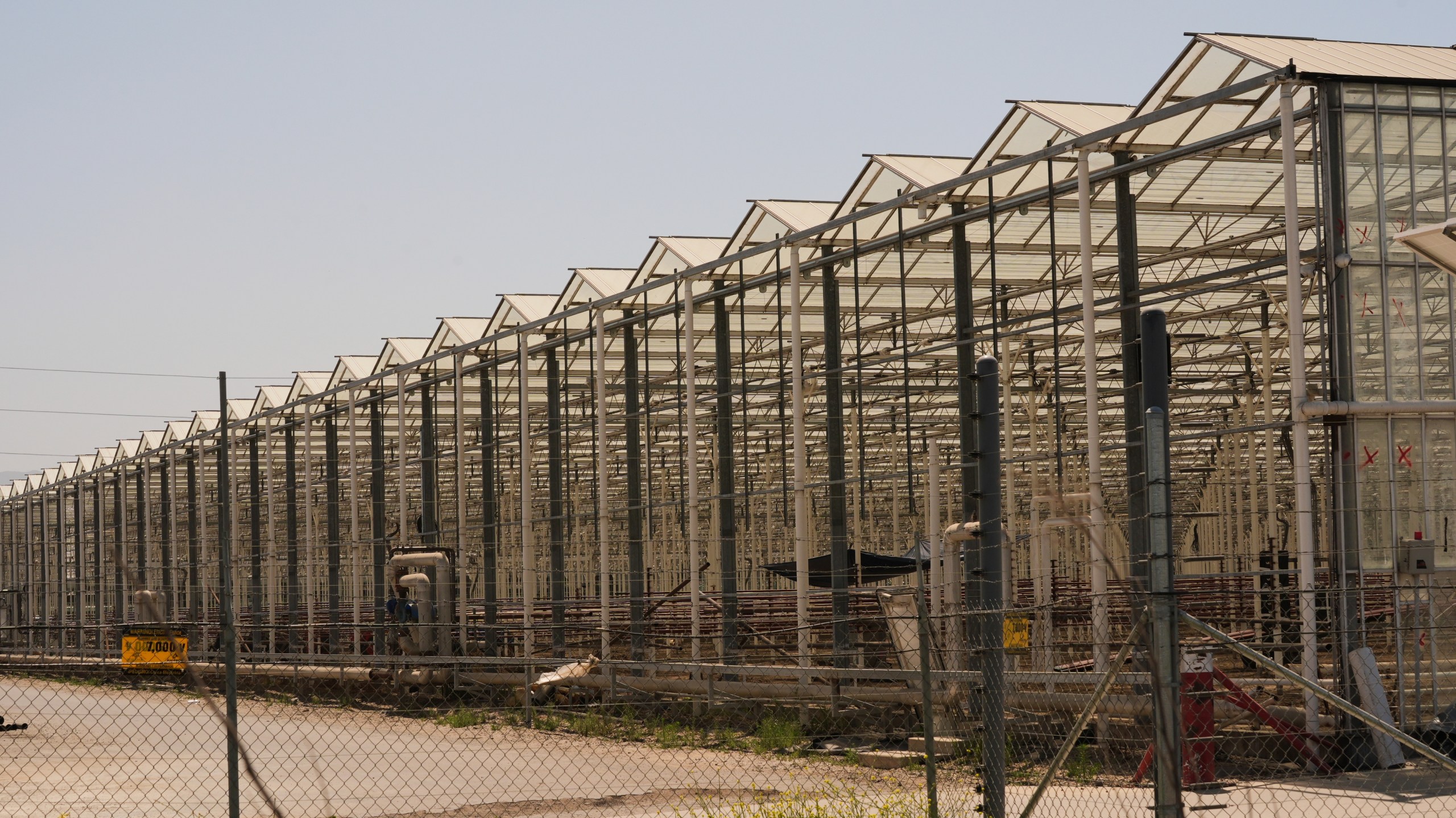 An exterior of Glass House Farms is shown, a day after an immigration raid on the facility, on Friday, July 11, 2025, in Camarillo, Calif. (AP Photo/Damian Dovarganes)
