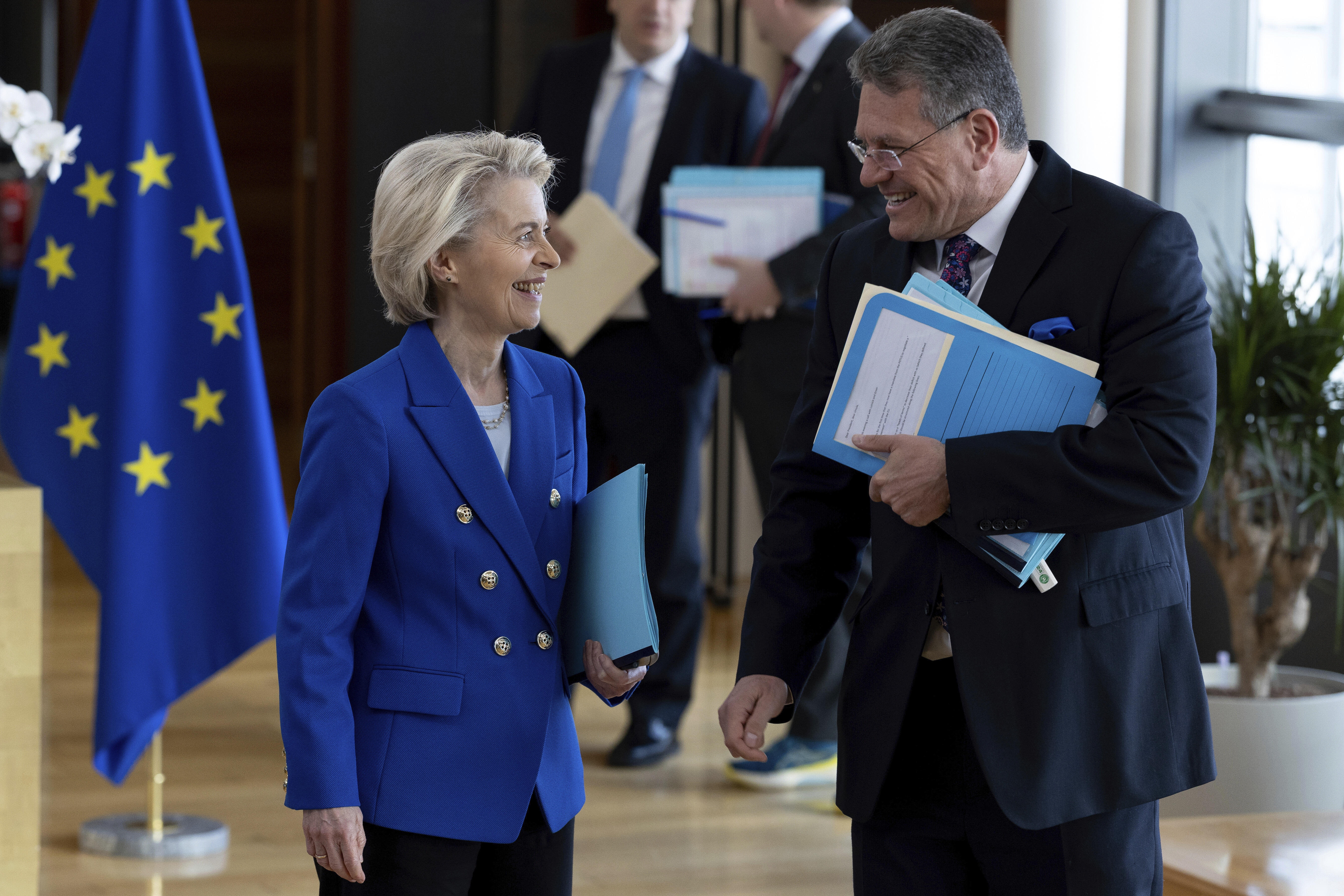 FILE - European Commissioner for Trade and Economic Security Maros Sefcovic, right, speaks with European Commission President Ursula von der Leyen, during the weekly meeting of the College of Commissioners at EU headquarters in Brussels, April 9, 2025. (AP Photo/Omar Havana, File)