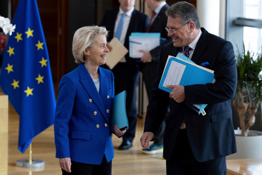 FILE - European Commissioner for Trade and Economic Security Maros Sefcovic, right, speaks with European Commission President Ursula von der Leyen, during the weekly meeting of the College of Commissioners at EU headquarters in Brussels, April 9, 2025. (AP Photo/Omar Havana, File)
