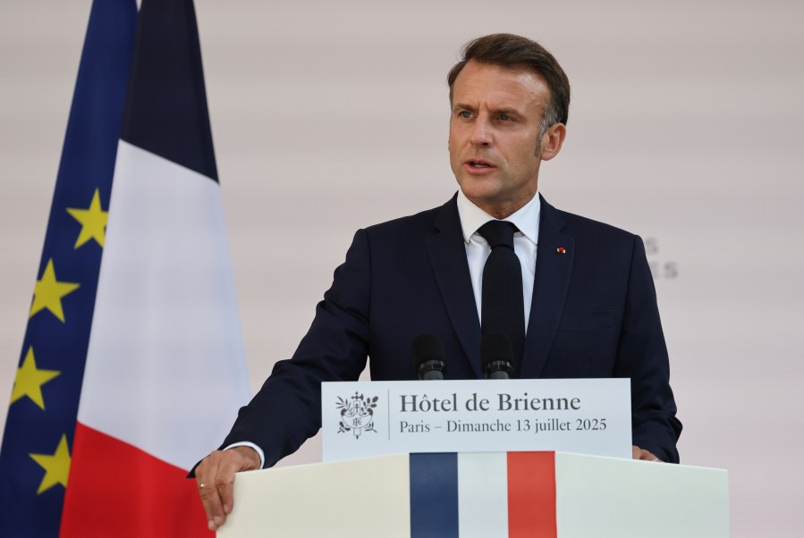 French President Emmanuel Macron speaks to the army leaders at the Hotel le Brienne, Sunday, July 13, 2025, ahead of the Bastille Day parade in Paris. (Ludovic Marin, Pool Photo via AP)
