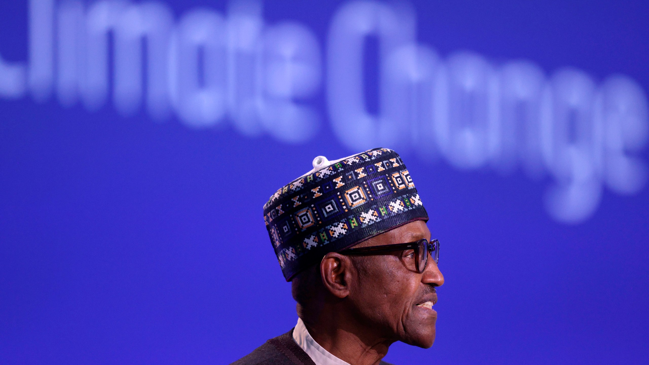FILE - Nigeria's President Muhammadu Buhari speaks during the UN Climate Change Conference COP26 in Glasgow, Scotland, Tuesday, Nov. 2, 2021. (Adrian Dennis/Pool Photo via AP, File)