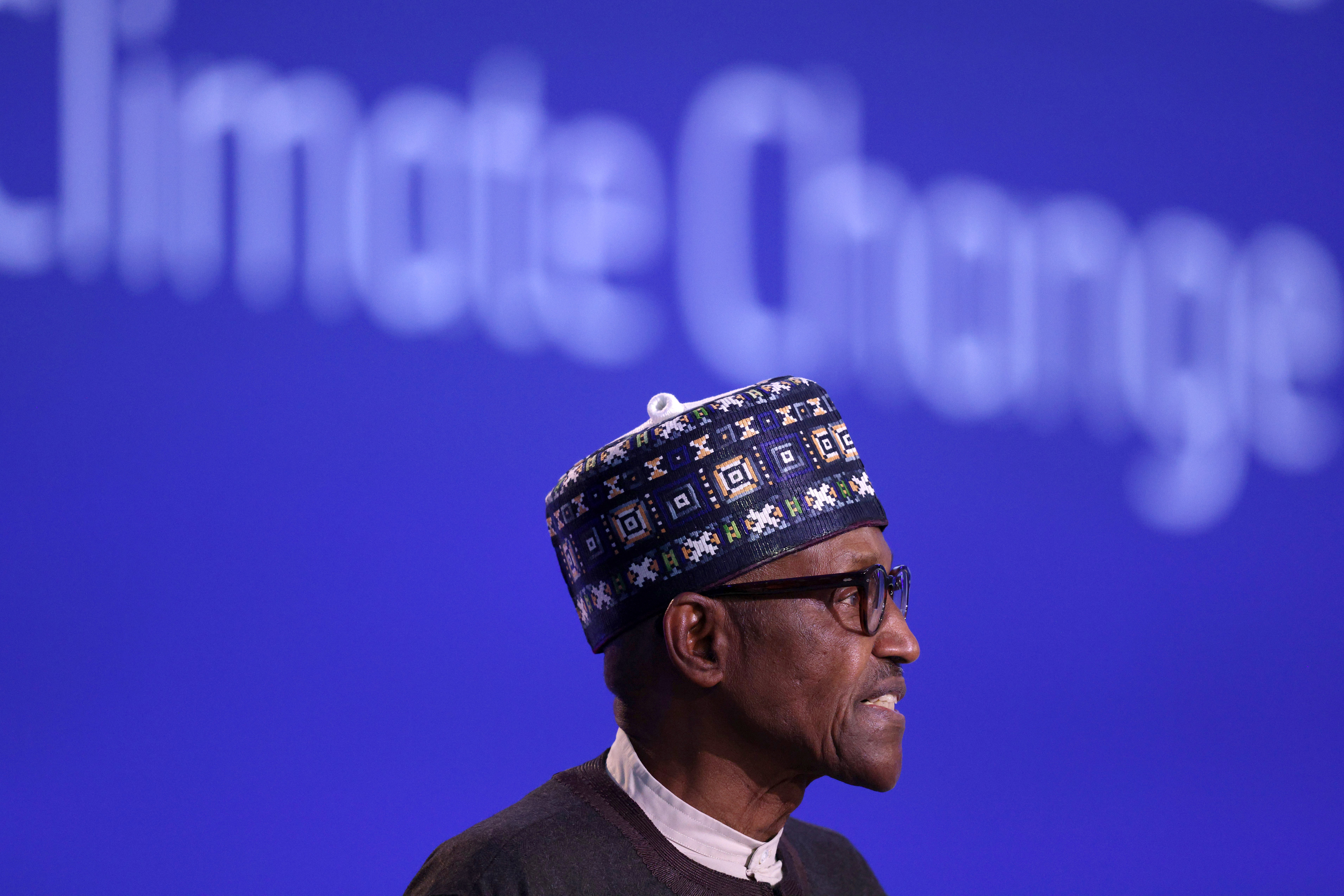 FILE - Nigeria's President Muhammadu Buhari speaks during the UN Climate Change Conference COP26 in Glasgow, Scotland, Tuesday, Nov. 2, 2021. (Adrian Dennis/Pool Photo via AP, File)
