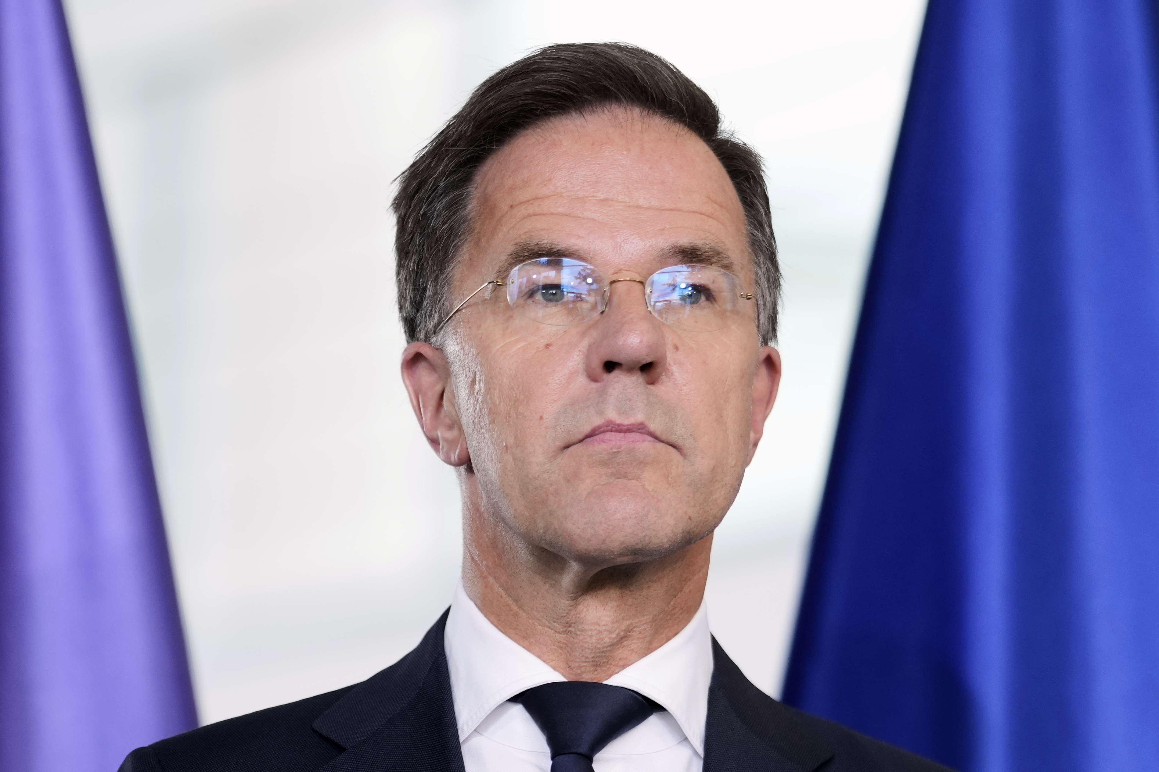 NATO Secretary General Mark Rutte attends a news conference with German Chancellor Friedrich Merz during a meeting at the chancellery in Berlin, Germany, Wednesday, July 9, 2025. (AP Photo/Markus Schreiber)