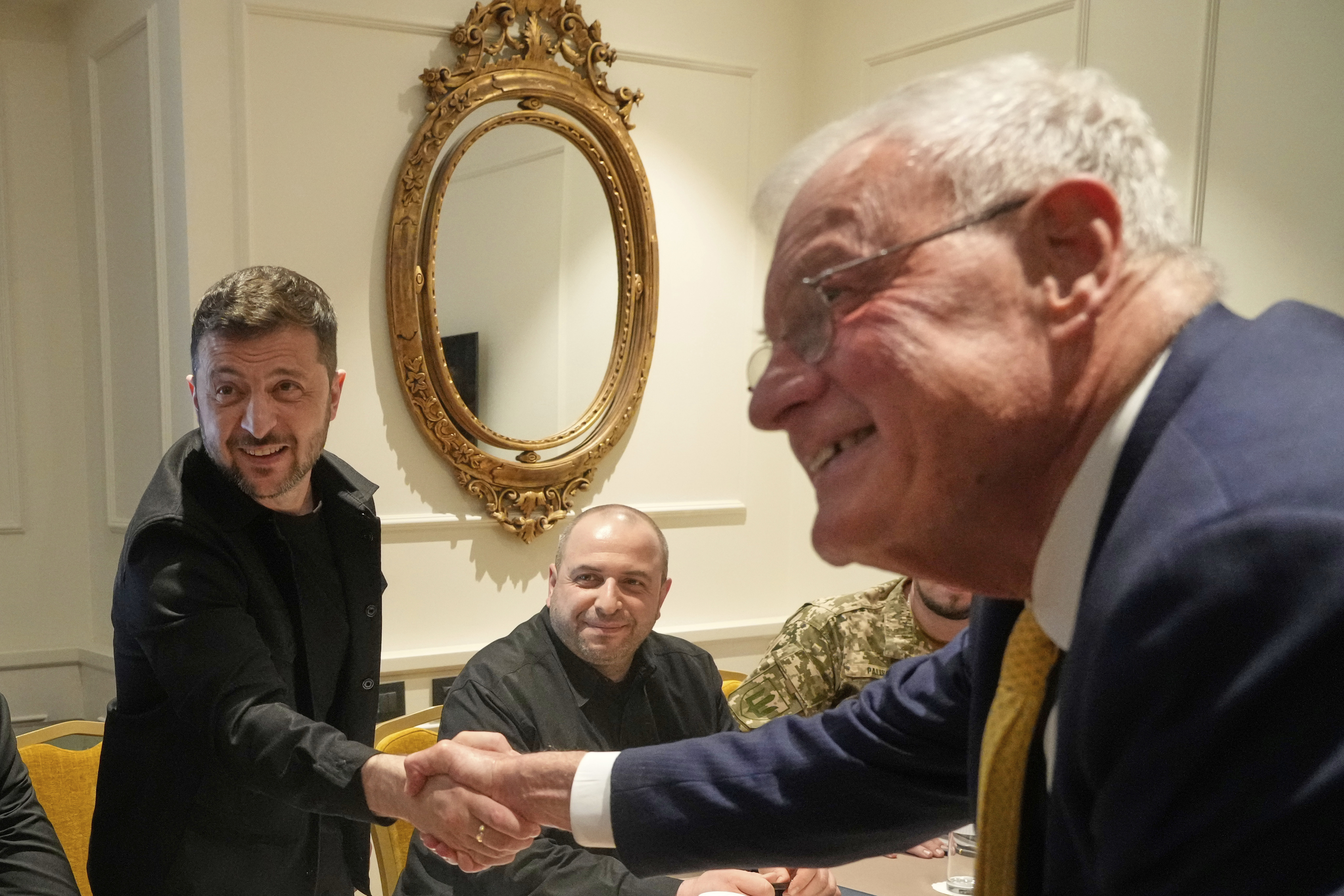 Ukraine President Volodymyr Zelenskyy, left, shakes hands with United States Special Envoy for Ukraine and Russia, Joseph Keith Kellogg, during their meeting in Rome, Italy, Wednesday, July 9, 2025. (AP Photo/Gregorio Borgia)