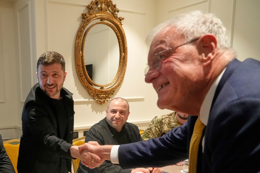 Ukraine President Volodymyr Zelenskyy, left, shakes hands with United States Special Envoy for Ukraine and Russia, Joseph Keith Kellogg, during their meeting in Rome, Italy, Wednesday, July 9, 2025. (AP Photo/Gregorio Borgia)
