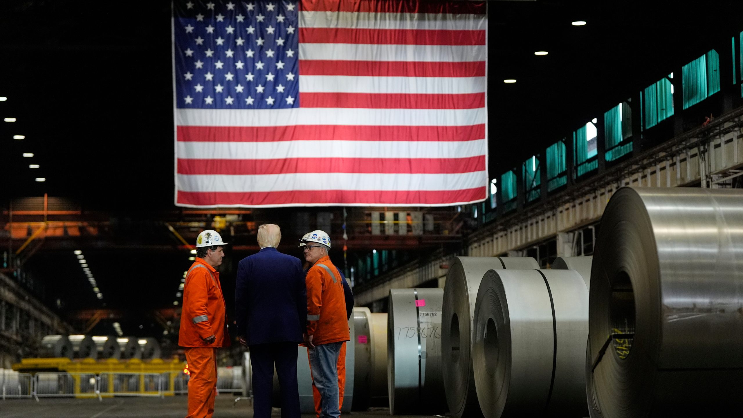 FILE - President Donald Trump talks to workers as he tours U.S. Steel Corporation's Mon Valley Works-Irvin plant, Friday, May 30, 2025, in West Mifflin, Pa. (AP Photo/Julia Demaree Nikhinson, File)