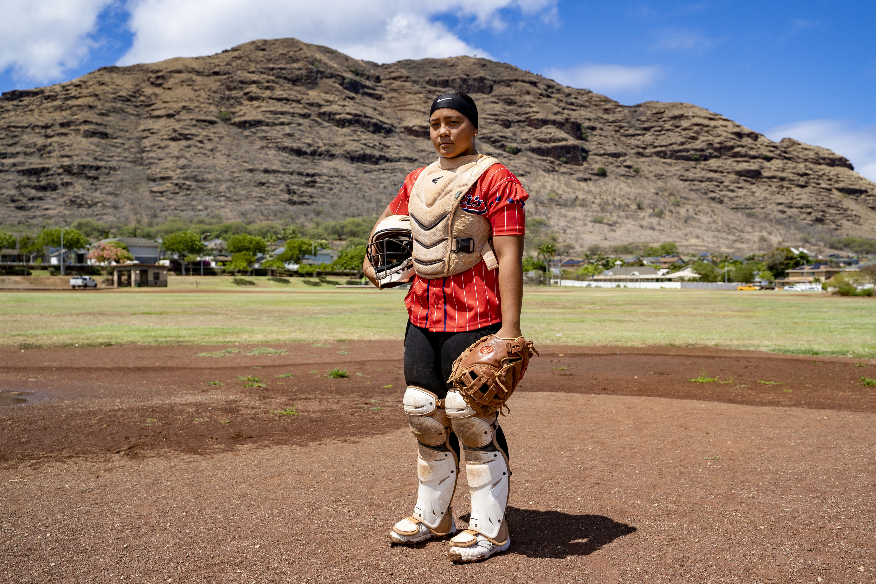 Ry-n Uyeda, 17, a senior at Waianae High School, poses for a portrait, Friday, July 11, 2025, in Waianae, Hawaii. (AP Photo/Mengshin Lin)