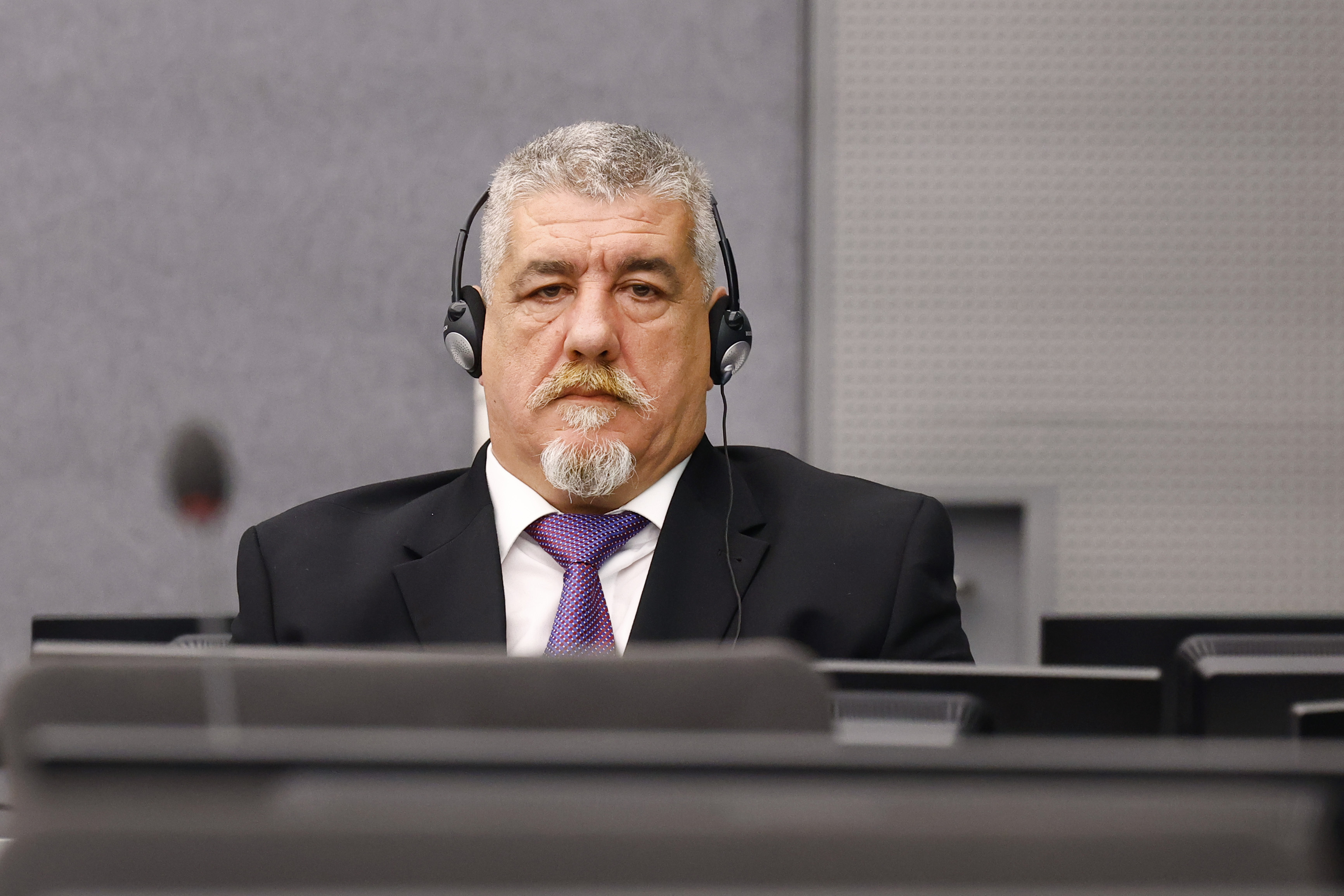 FILE - Former Kosovo Liberation Army (KLA) member Pjeter Shala attends his trial as judges at the Kosovo Specialist Chambers will hand down a judgment in The Hague, Netherlands, July 16 2024. (Piroschka van de Wouw/Pool photo via AP, File)