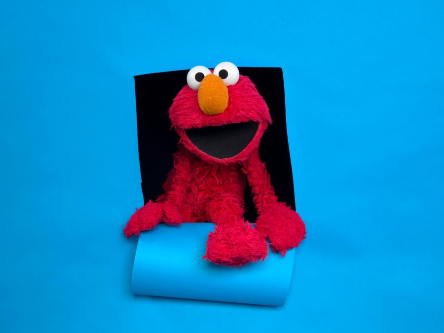 FILE - Elmo of the film "Being Elmo" poses for a portrait in the Fender Music Lodge during the 2011 Sundance Film Festival in Park City, Utah on Jan. 24, 2011. (AP Photo/Victoria Will, File)