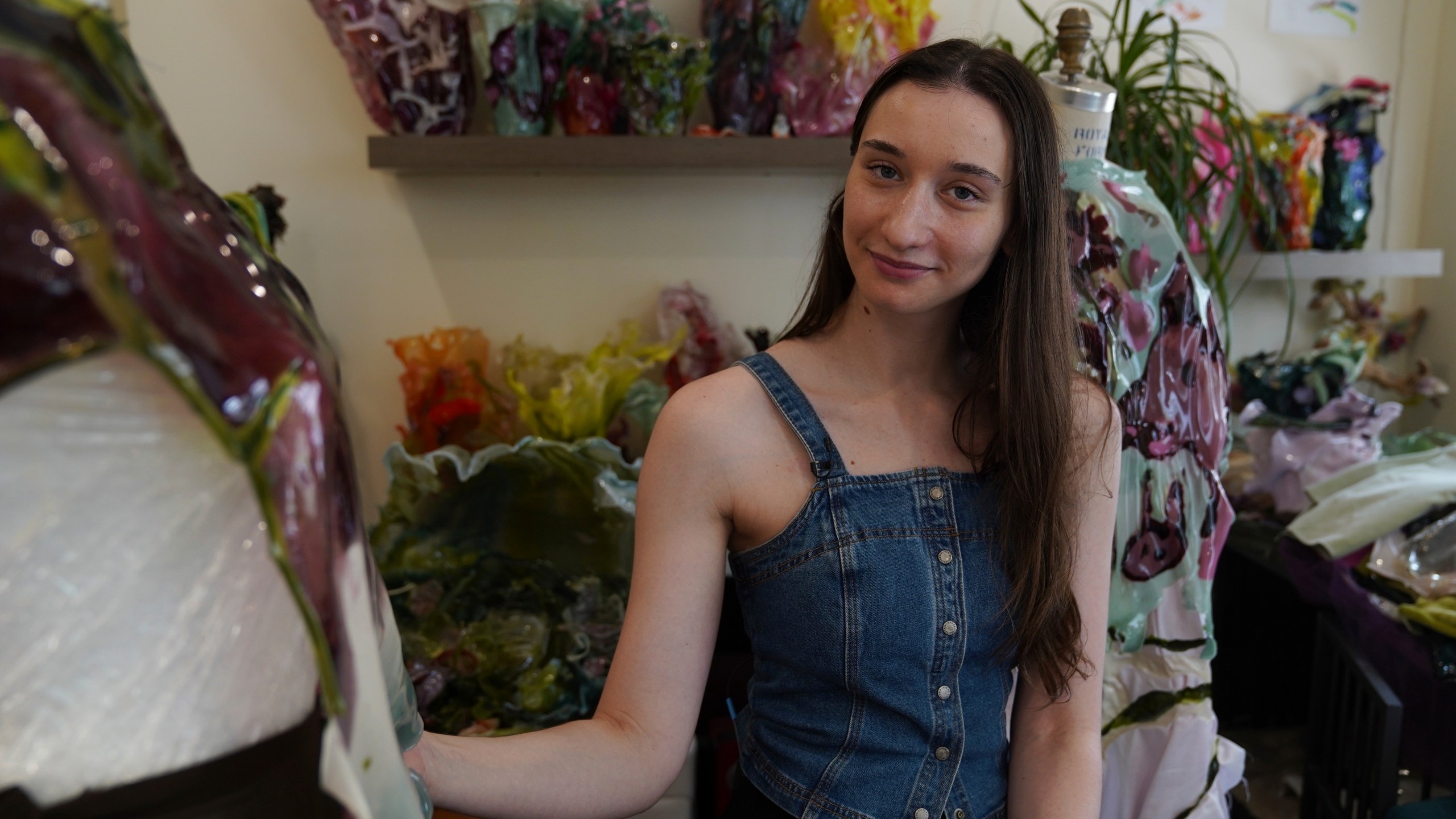 Fashion designer Caroline Zimbalist poses in her studio on Friday, June 6, 2025, in the Queens borough of New York. (AP Photo/Mary Conlon)