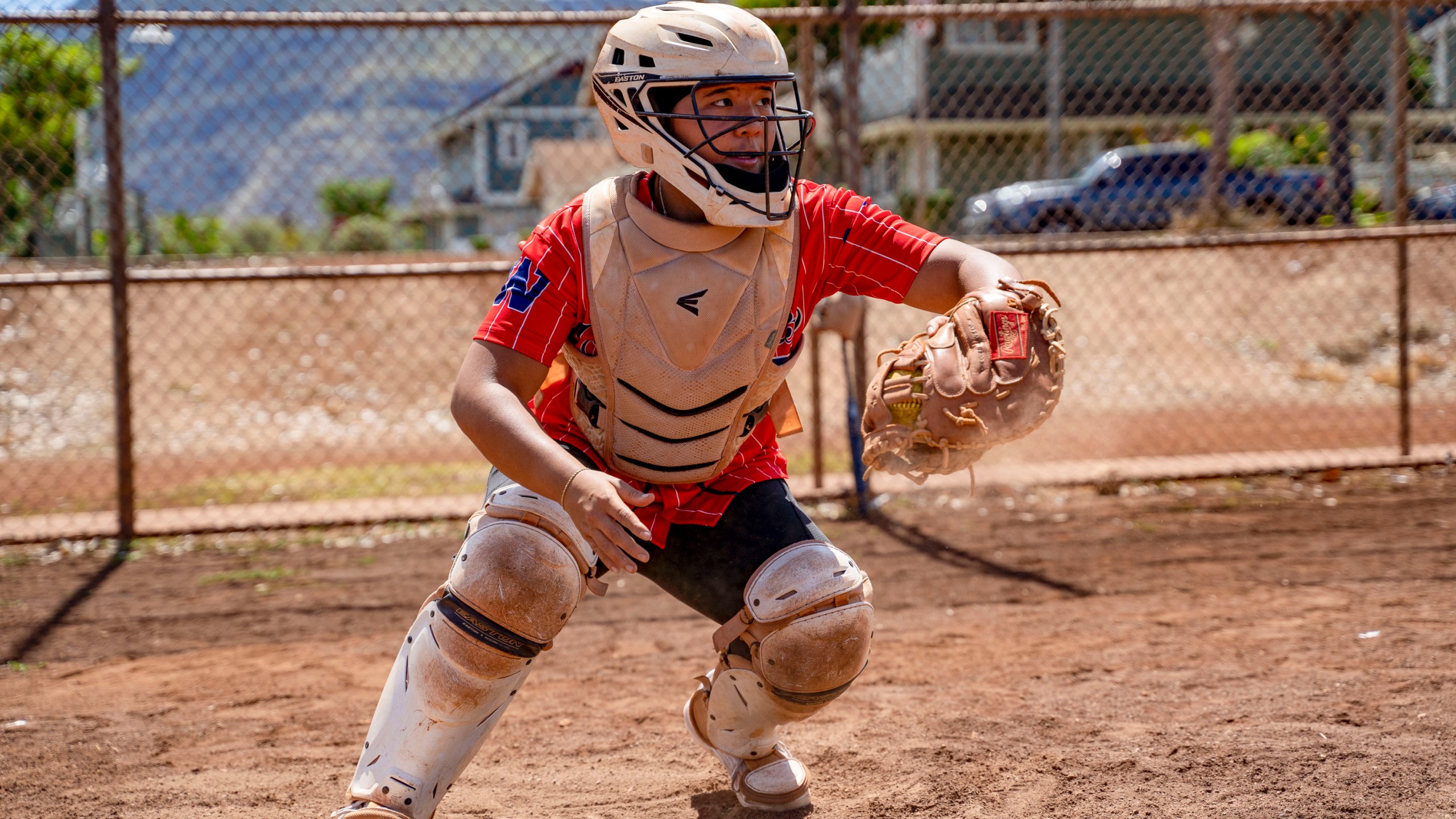 Ry-n Uyeda runs through a catching drill, Friday, July 11, 2025, in Waianae, Hawaii. (AP Photo/Mengshin Lin)