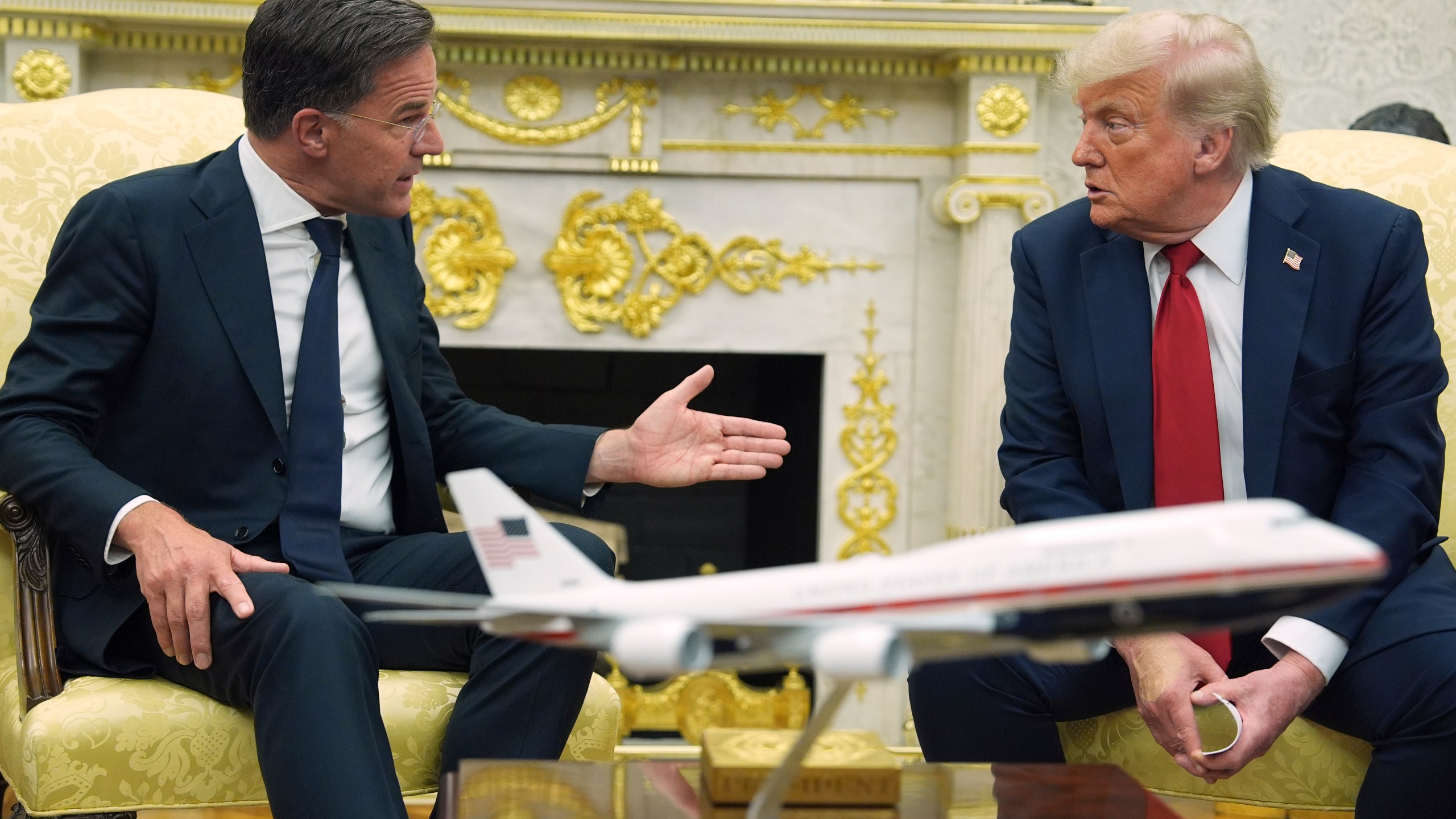 NATO Secretary General Mark Rutte speaks as President Donald Trump listens during a meeting in the Oval Office of the White House, Monday, July 14, 2025, in Washington. (AP Photo/Evan Vucci)