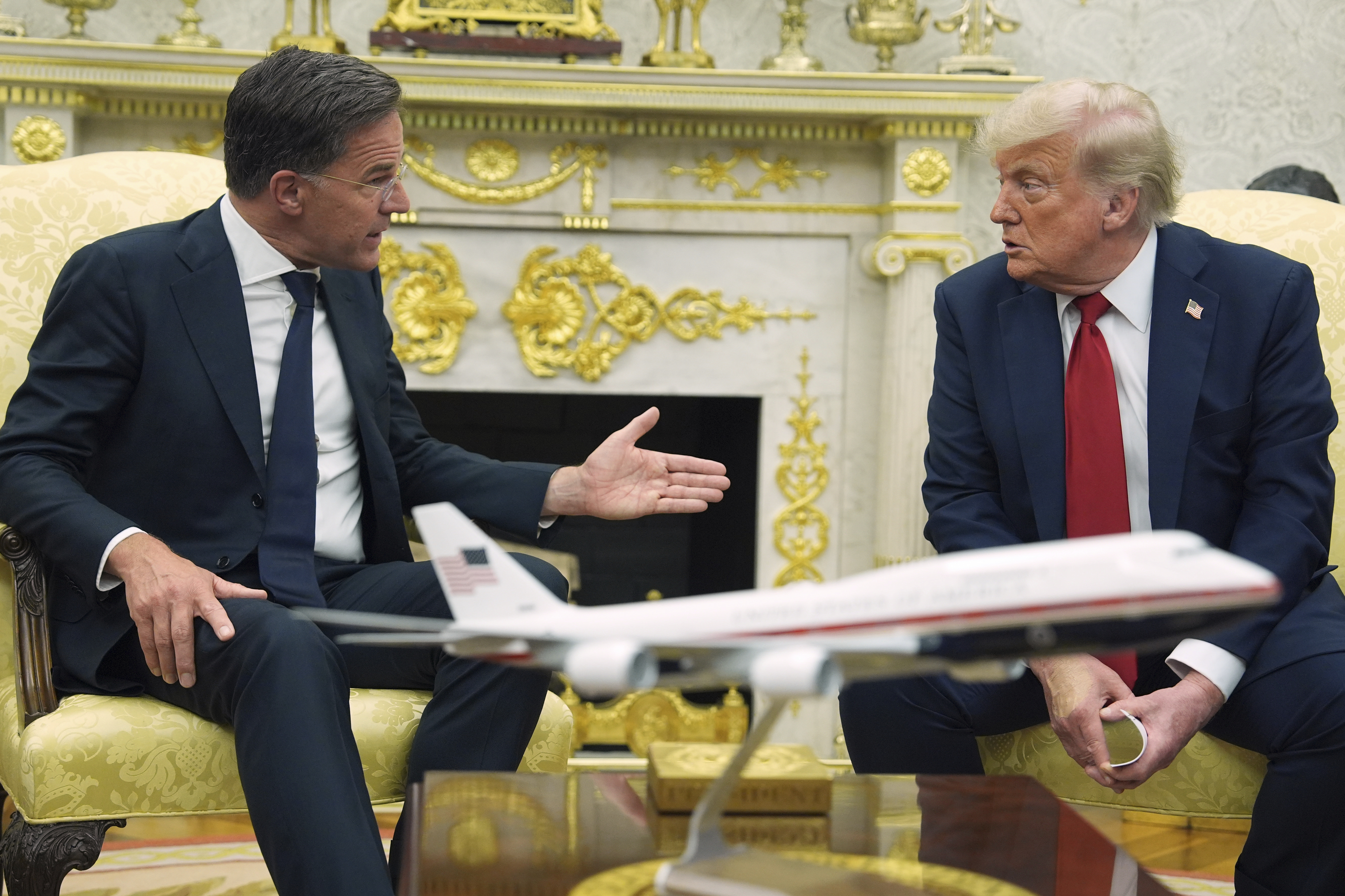 NATO Secretary General Mark Rutte speaks as President Donald Trump listens during a meeting in the Oval Office of the White House, Monday, July 14, 2025, in Washington. (AP Photo/Evan Vucci)