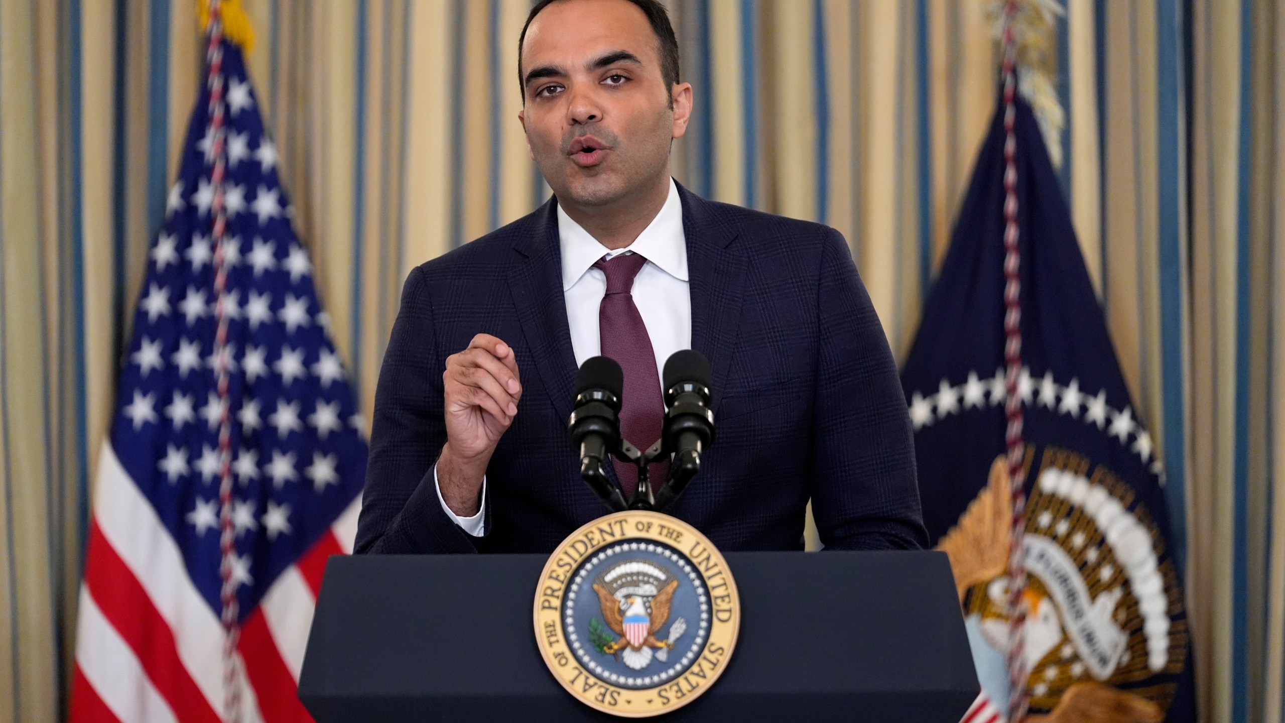 FILE - Rohit Chopra, director of the Consumer Financial Protection Bureau, speaks as President Joe Biden meets with his Competition Council to announce new actions to lower costs for families in the State Dining Room of the White House in Washington, on March 5, 2024. (AP Photo/Andrew Harnik, File)
