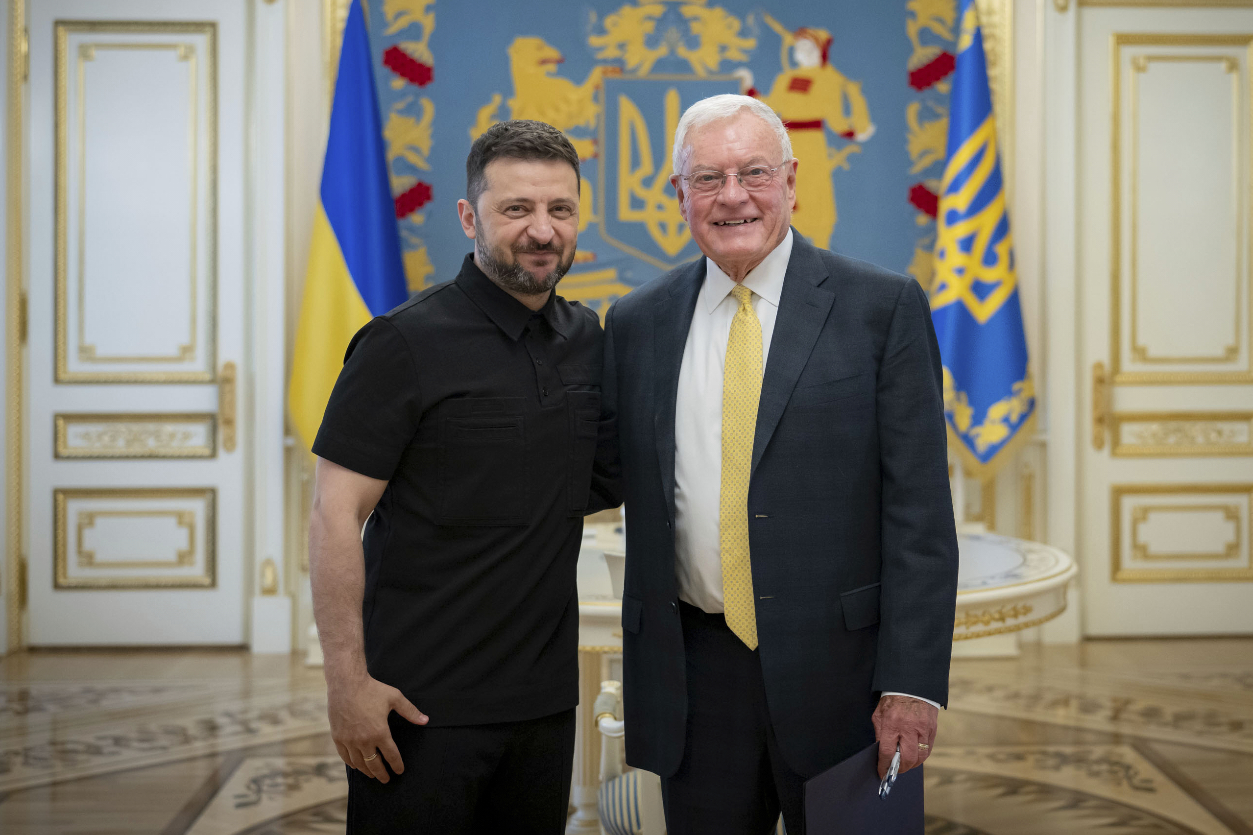 Ukrainian President Volodymyr Zelenskyy, left, and United States Special Envoy for Ukraine and Russia, Joseph Keith Kellogg pose for a photo in Kyiv, Ukraine, Monday, July 14, 2025. (Ukrainian Presidential Press Office via AP)