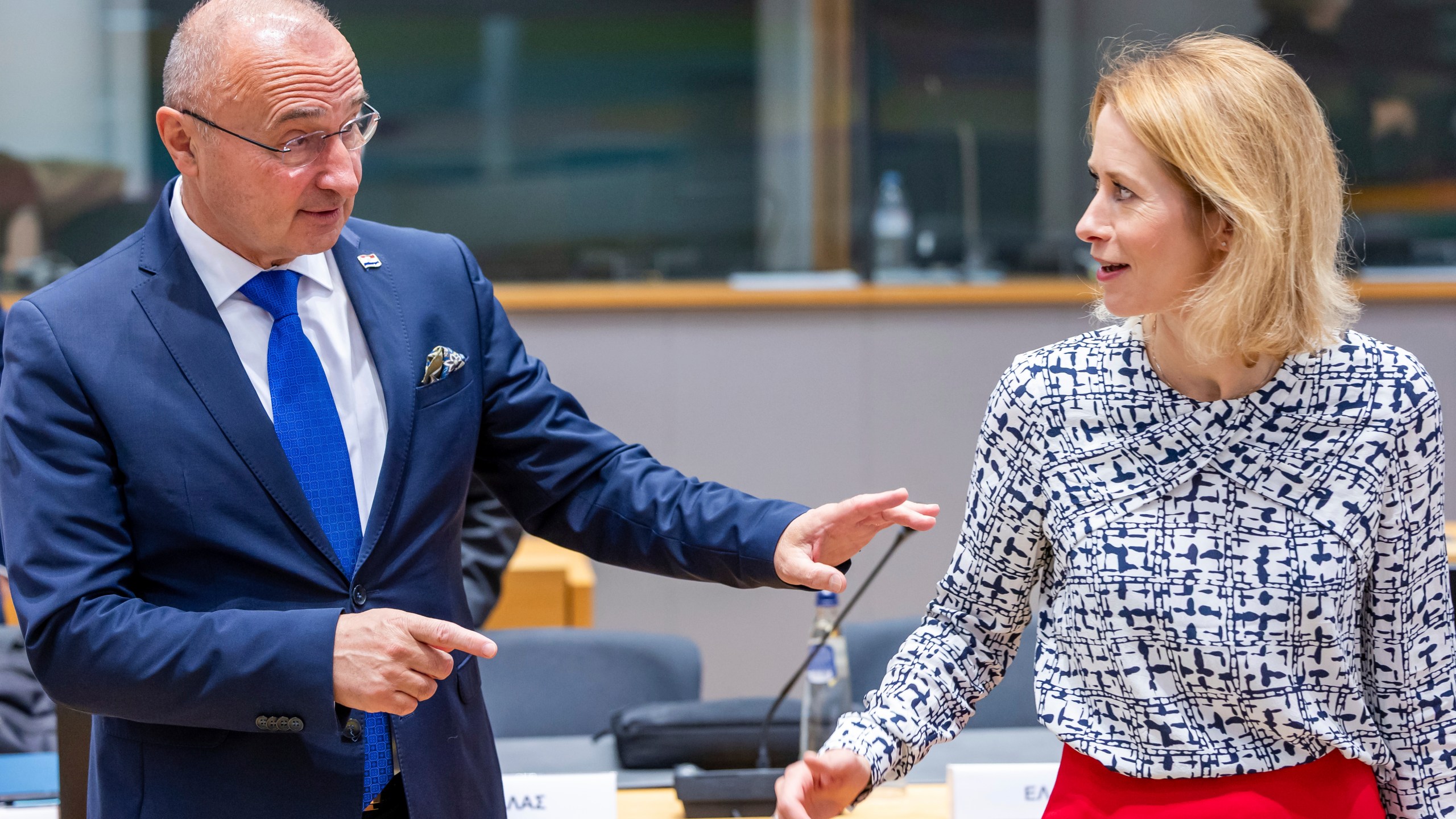 Croatia's Foreign Minister Gordan Grlic Radman, left, talks with European Union foreign policy chief Kaja Kallas during the EU foreign ministers meeting at the EU Council building in Brussels, Tuesday, July 15, 2025. (AP Photo/Geert Vanden Wijngaert)