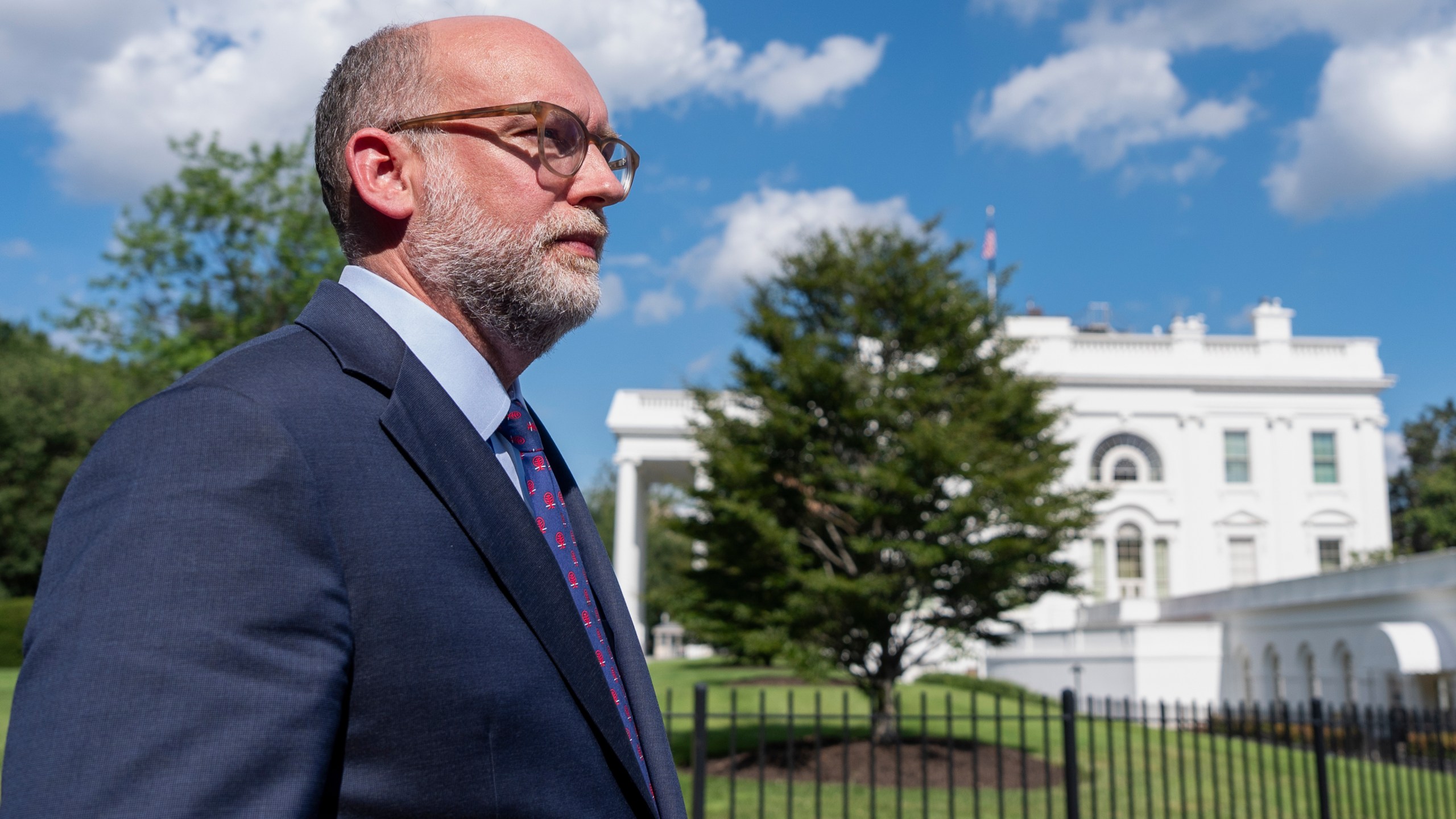 FILE - Office of Management and Budget Director Russell Vought walks at the White House, Monday, July 7, 2025, in Washington. (AP Photo/Alex Brandon, File)