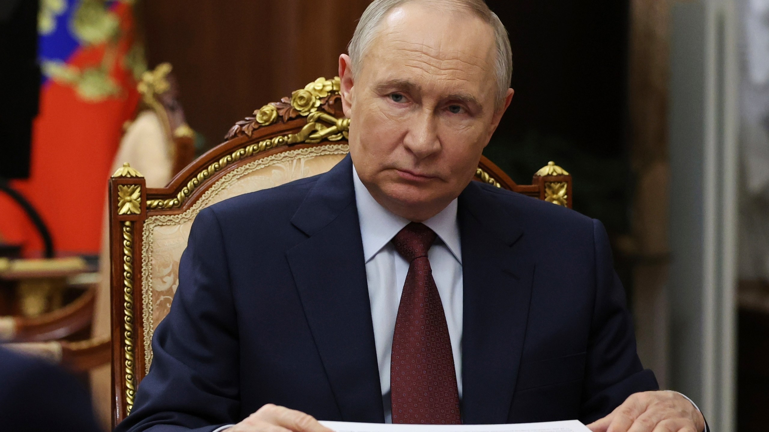 Russian President Vladimir Putin listens to Russian Academy of Sciences President Gennady Krasnikov during their meeting at the Kremlin in Moscow, Russia, Tuesday, July 15, 2025. (Mikhail Metzel, Sputnik, Kremlin Pool Photo via AP)