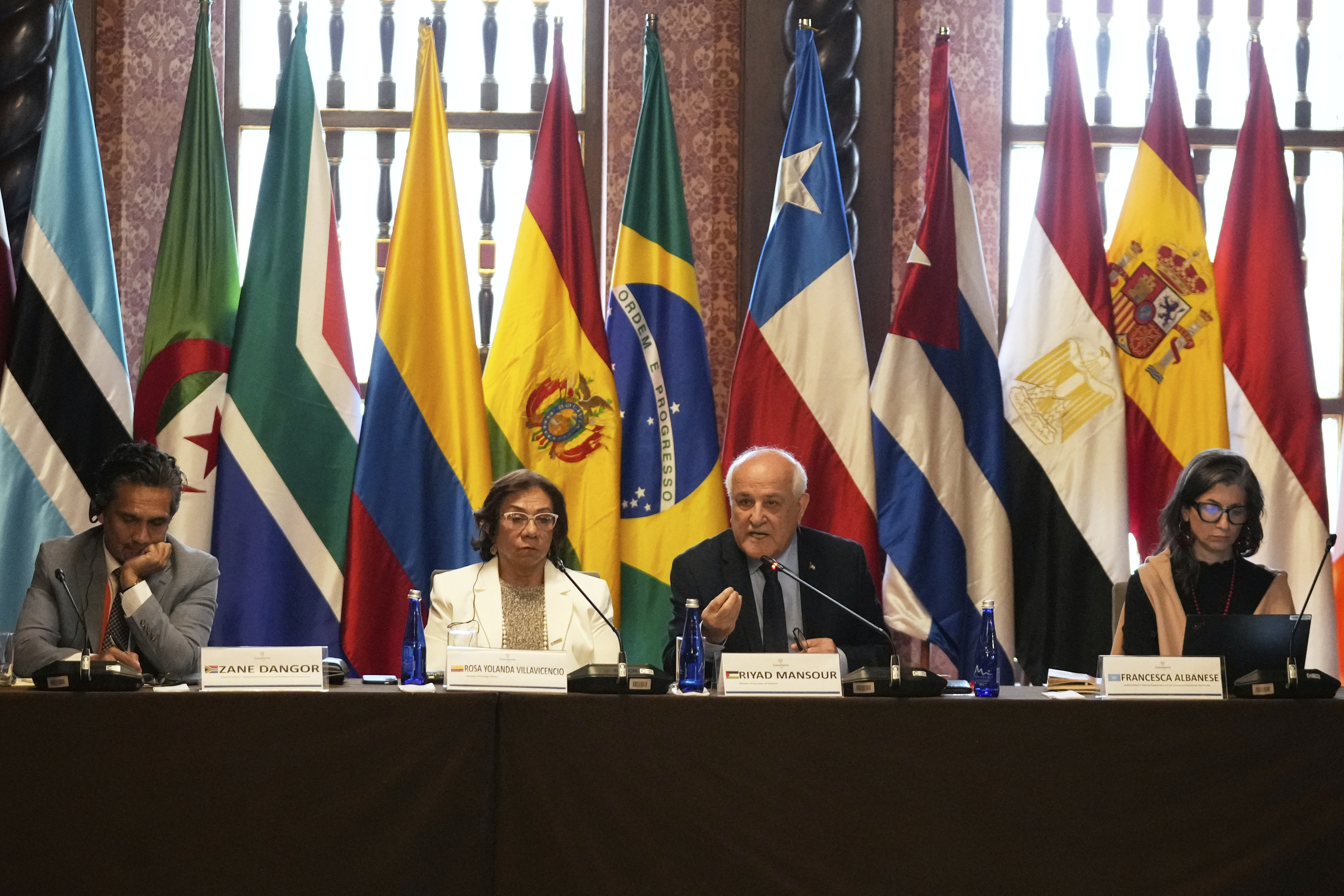 Riyad Mansour, Palestinian U.N. ambassador, second from right, speaks during a two-day conference to address the Israel-Hamas war and Israel's military actions in Gaza, in Bogota, Colombia, Tuesday, July 15, 2025. From left are South Africa's Foreign Minister Zane Dangor, Colombian Foreign Minister Rosa Yolanda Villavicencio and U.N. Special Rapporteur for the Occupied Palestinian Territories Francesca Albanese. (AP Photo/Fernando Vergara)