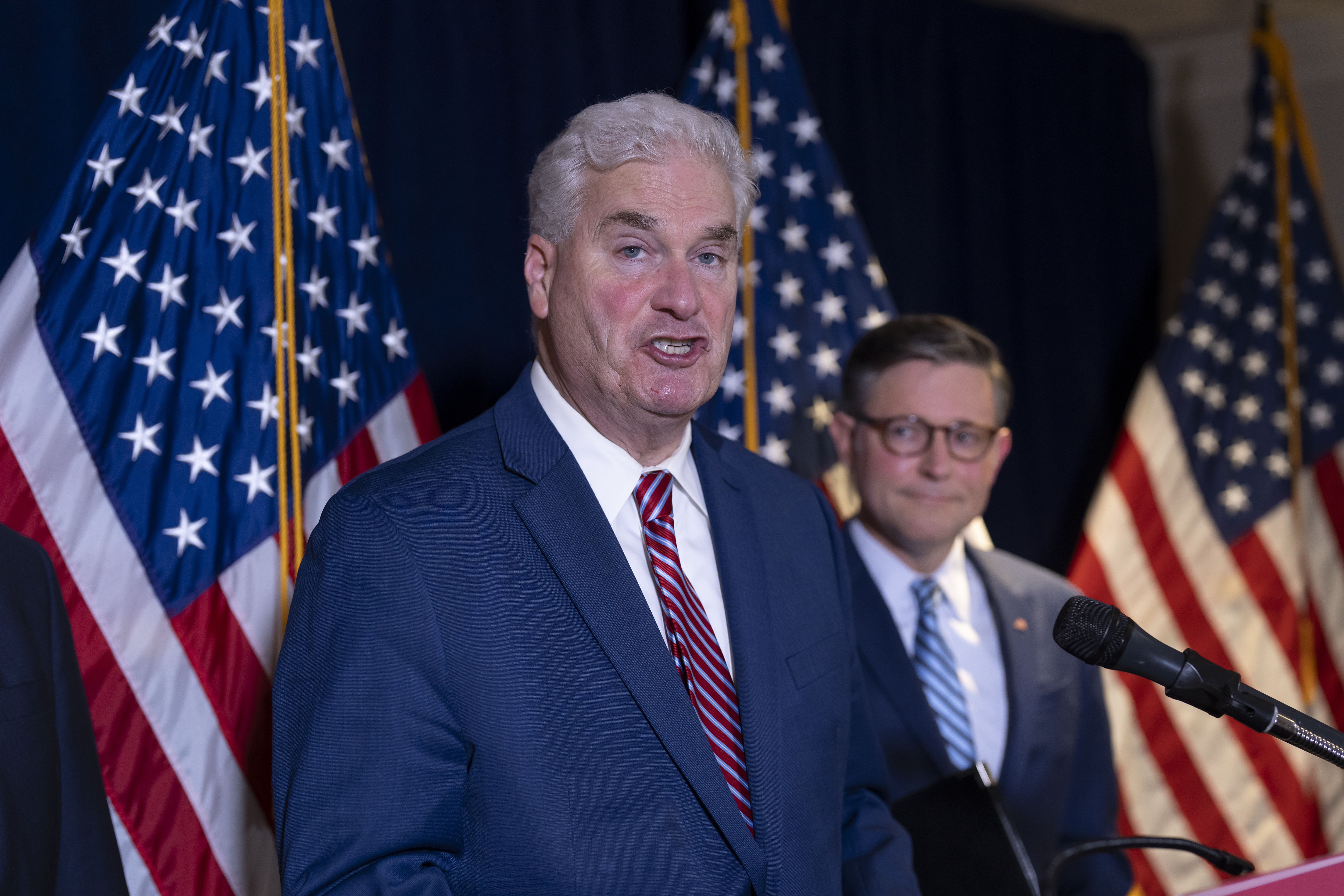 House Majority Whip Tom Emmer, R-Minn., left, a longtime supporter of cryptocurrency, joined at right by Speaker of the House Mike Johnson, R-La., discusses legislation in the week ahead that could impact the industry, during a news conference at the Republican National Committee headquarters in Washington, Tuesday, July 15, 2025. (AP Photo/J. Scott Applewhite)
