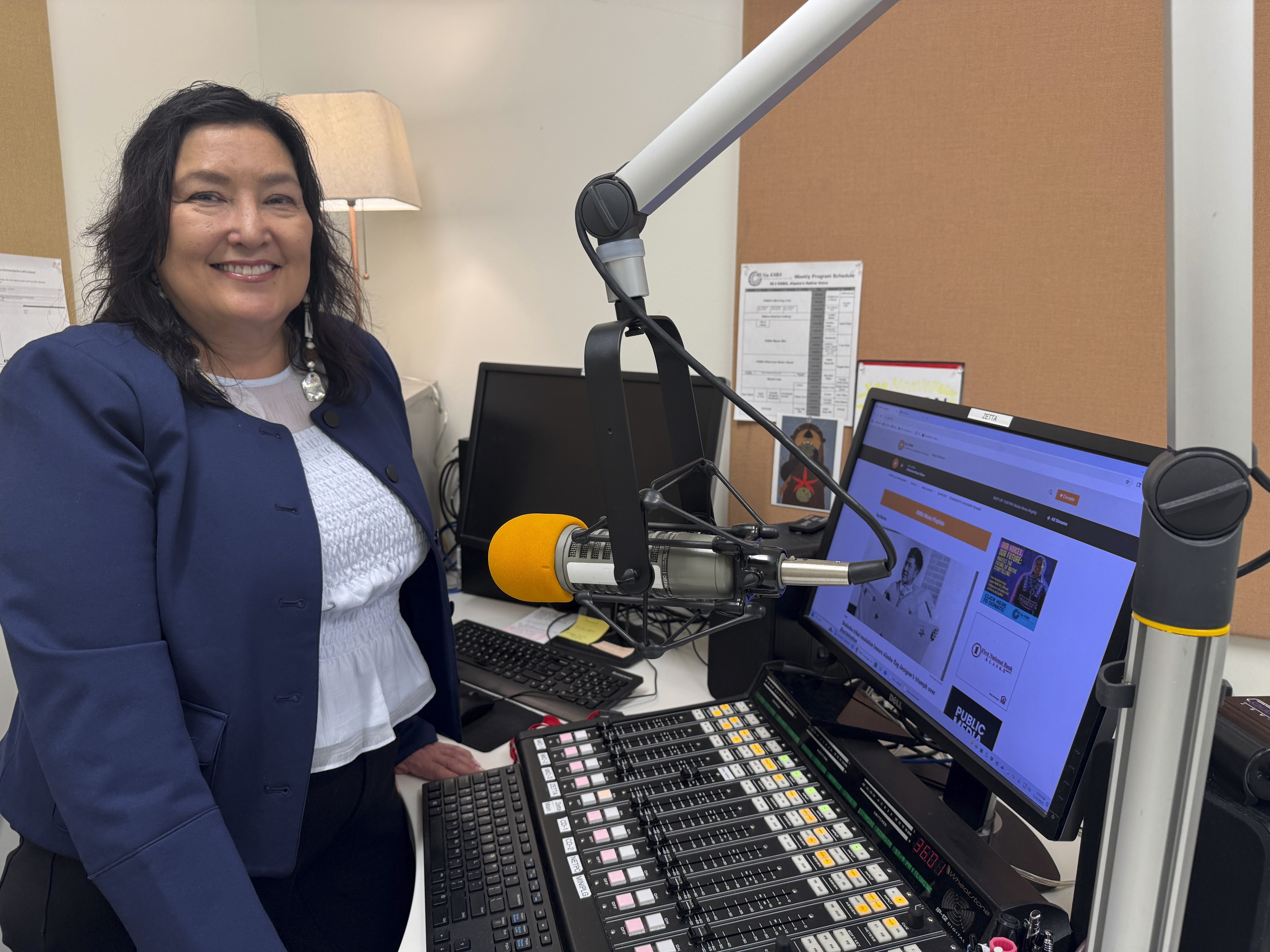 Jaclyn Sallee, president and chief operating for Koahnic Broadcast Corp., poses for a photo July 10, 2025, at the Anchorage, Alaska, studios of KBNA, the flagship station for National Native News. (AP Photo/Mark Thiessen)