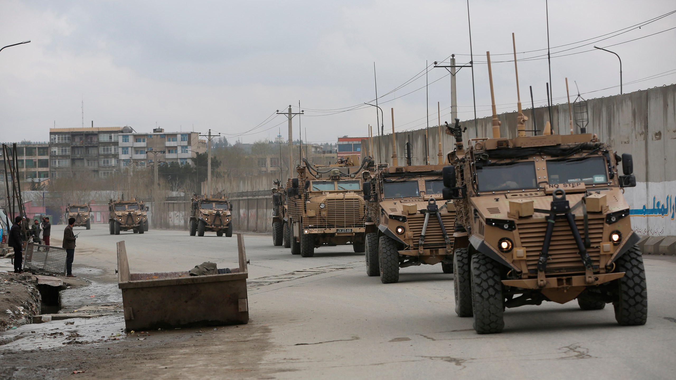 FILE - This March 25, 2020 file photo shows British troops with NATO-led Resolute Support Mission forces in Kabul, Afghanistan. (AP Photo/Rahmat Gul, file)