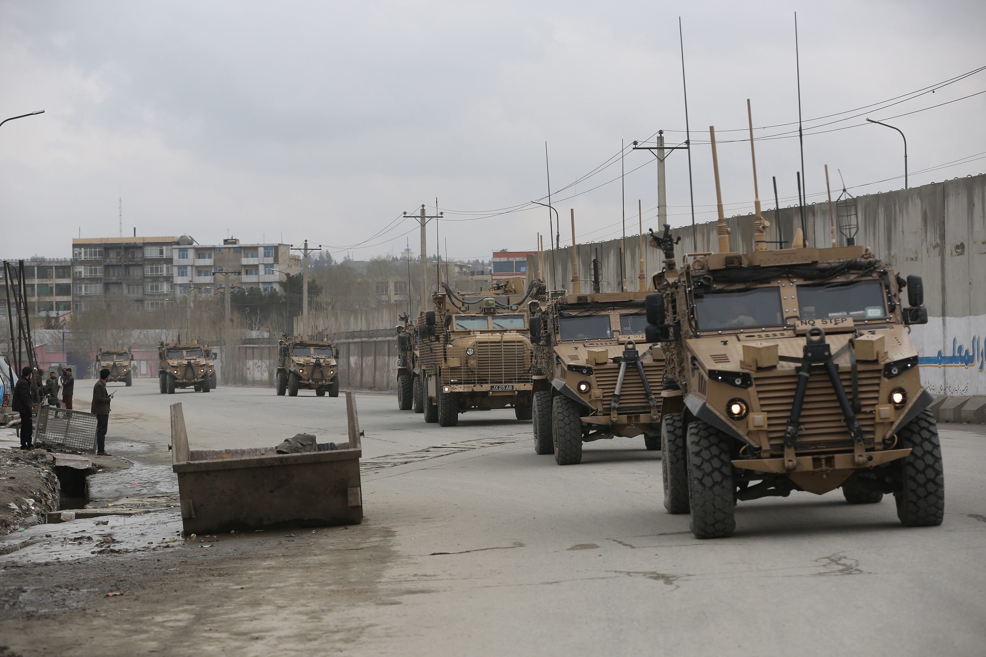 FILE - This March 25, 2020 file photo shows British troops with NATO-led Resolute Support Mission forces in Kabul, Afghanistan. (AP Photo/Rahmat Gul, file)
