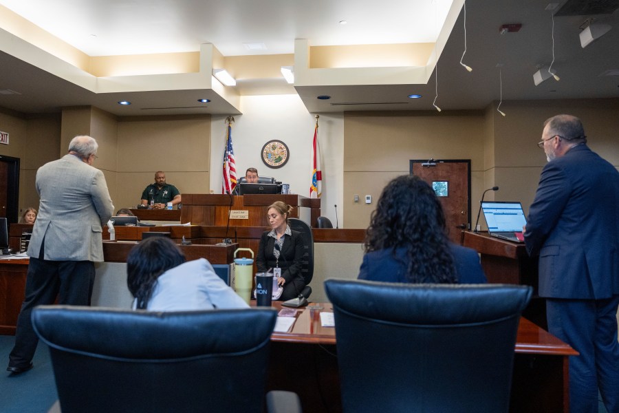 Public defender Peter Mills and prosecutor Jack Campbell appear before Second Judicial Circuit Judge Lance Neff during a case management conference in Tallahassee, Fla. on Wednesday, July 16, 2025 in the case of Phoenix Ikner, a Florida State University student accused of carrying out a mass shooting on campus. (Alicia Devine/Tallahassee Democrat via AP, Pool)