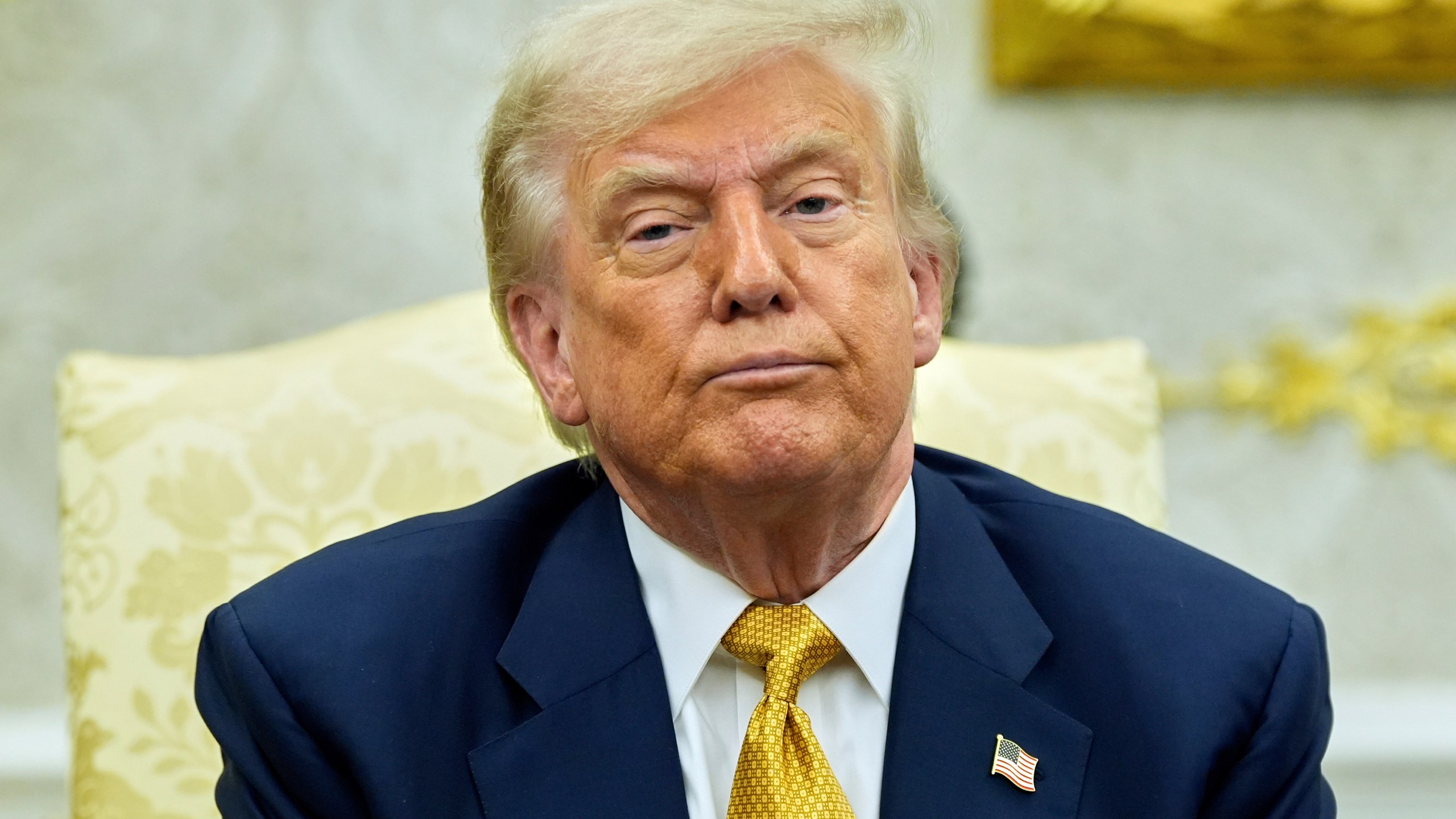 President Donald Trump listens during a meeting with Bahrain's Crown Prince Salman bin Hamad Al Khalifa in the Oval Office of the White House, Wednesday, July 16, 2025, in Washington. (AP Photo/Alex Brandon)