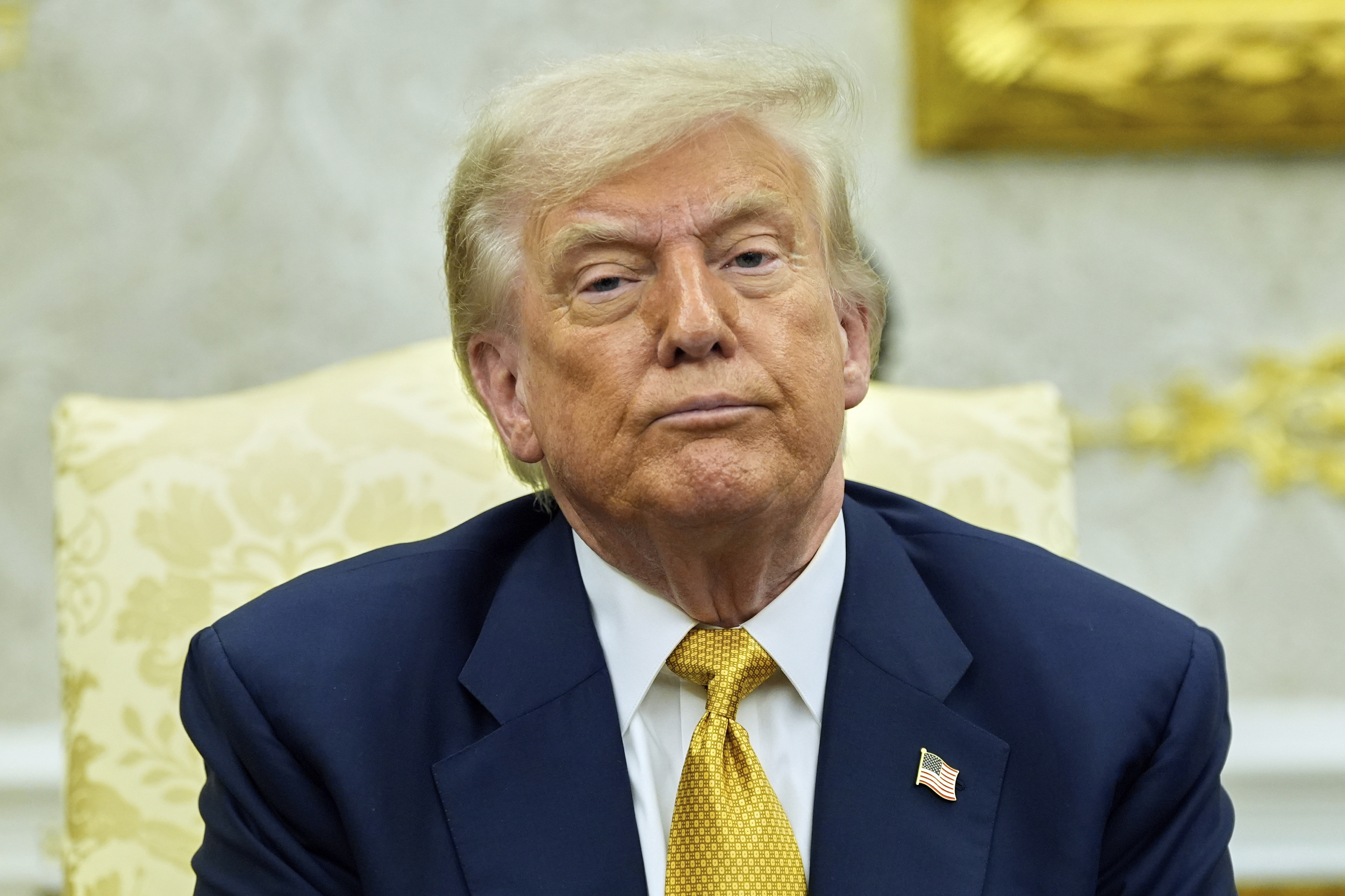 President Donald Trump listens during a meeting with Bahrain's Crown Prince Salman bin Hamad Al Khalifa in the Oval Office of the White House, Wednesday, July 16, 2025, in Washington. (AP Photo/Alex Brandon)