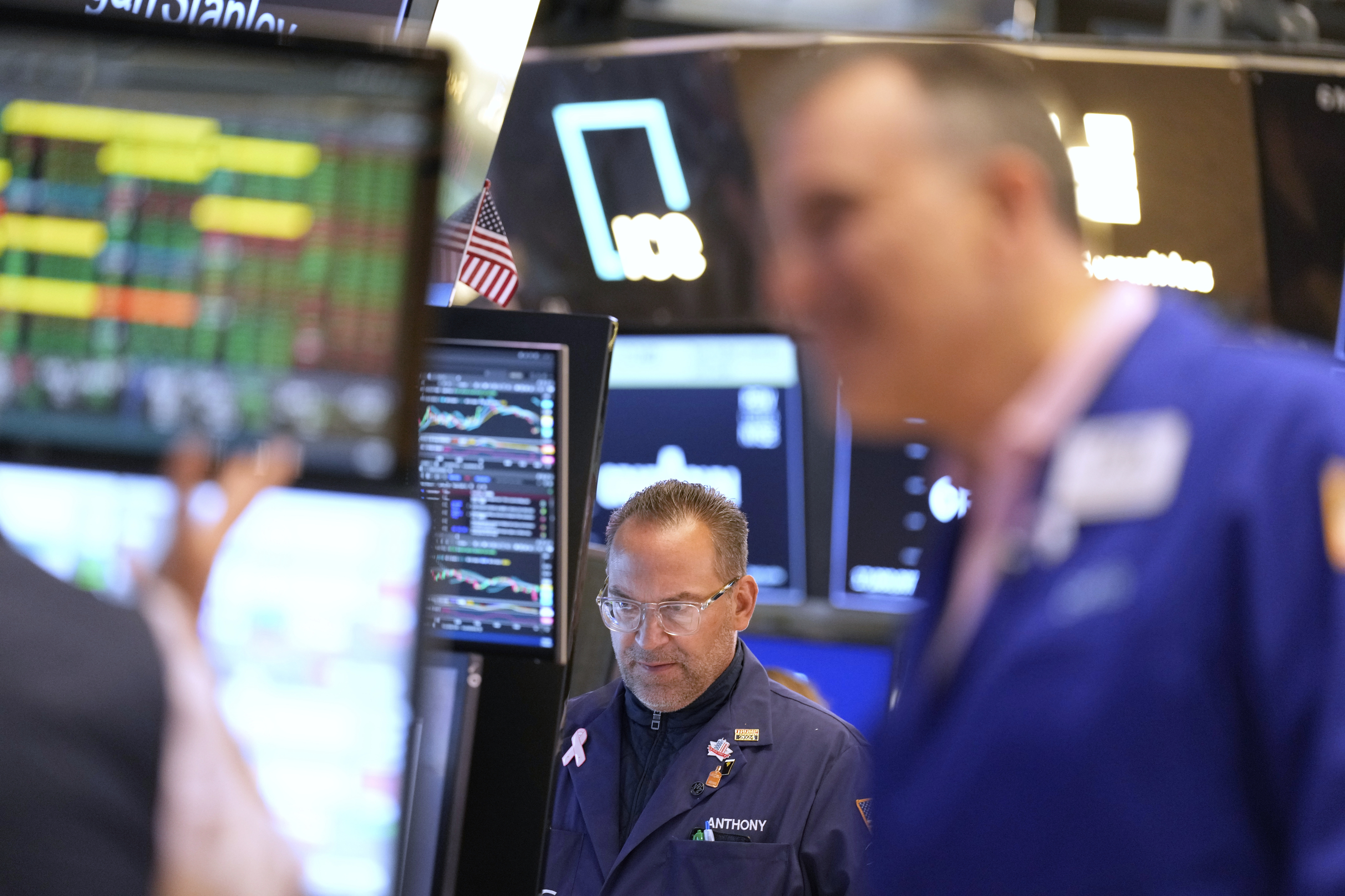 Anthony Matesic works on the floor at the New York Stock Exchange in New York, Wednesday, July 16, 2025. (AP Photo/Seth Wenig)