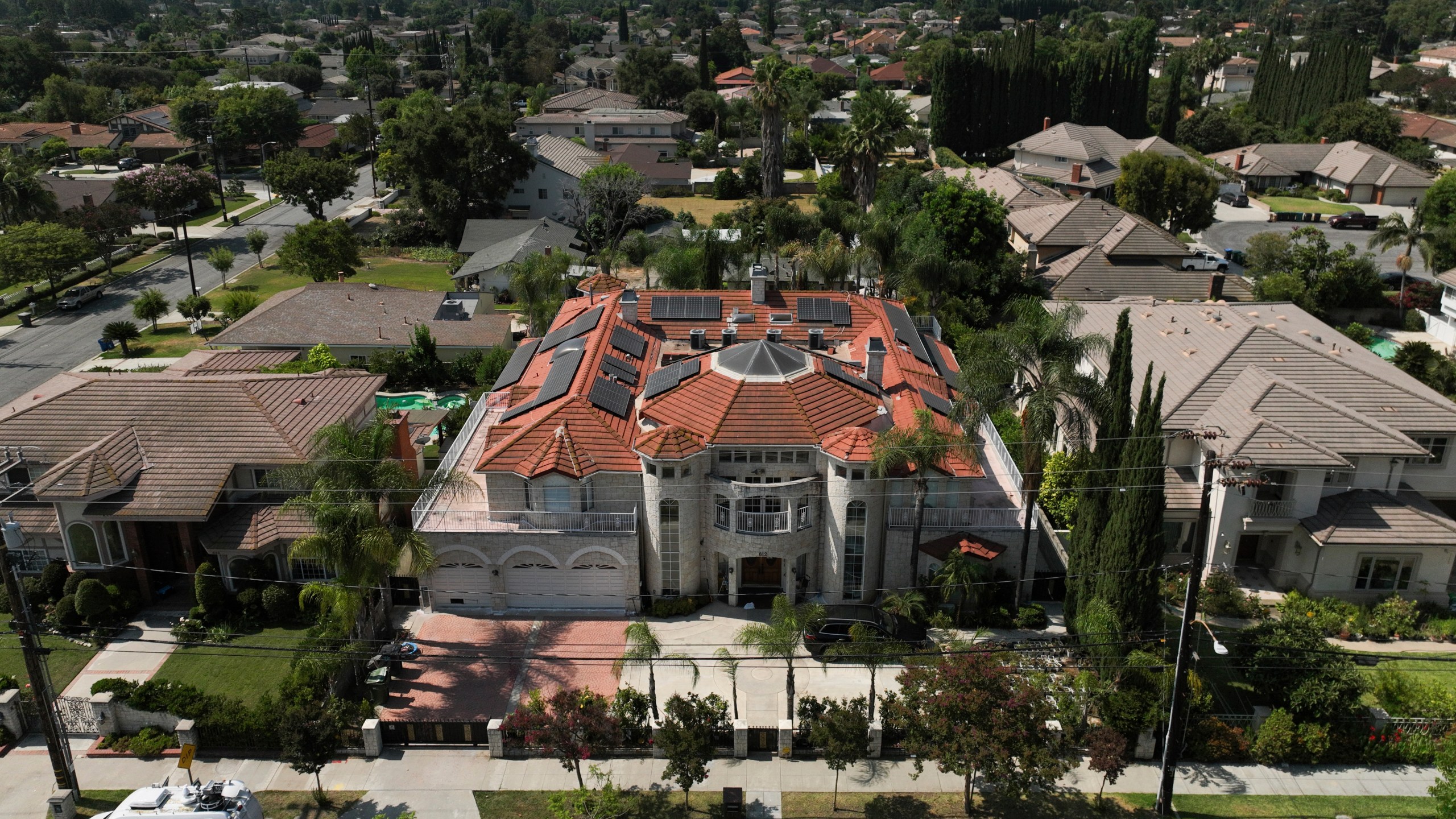 An aerial view shows the home of Silvia Zhang and Guojun Xuan on Wednesday, July 16, 2025, in Arcadia, Calif., where a number of children were removed from the couple's home after a child abuse allegation in May, according to Arcadia police. (AP Photo/Jae C. Hong)