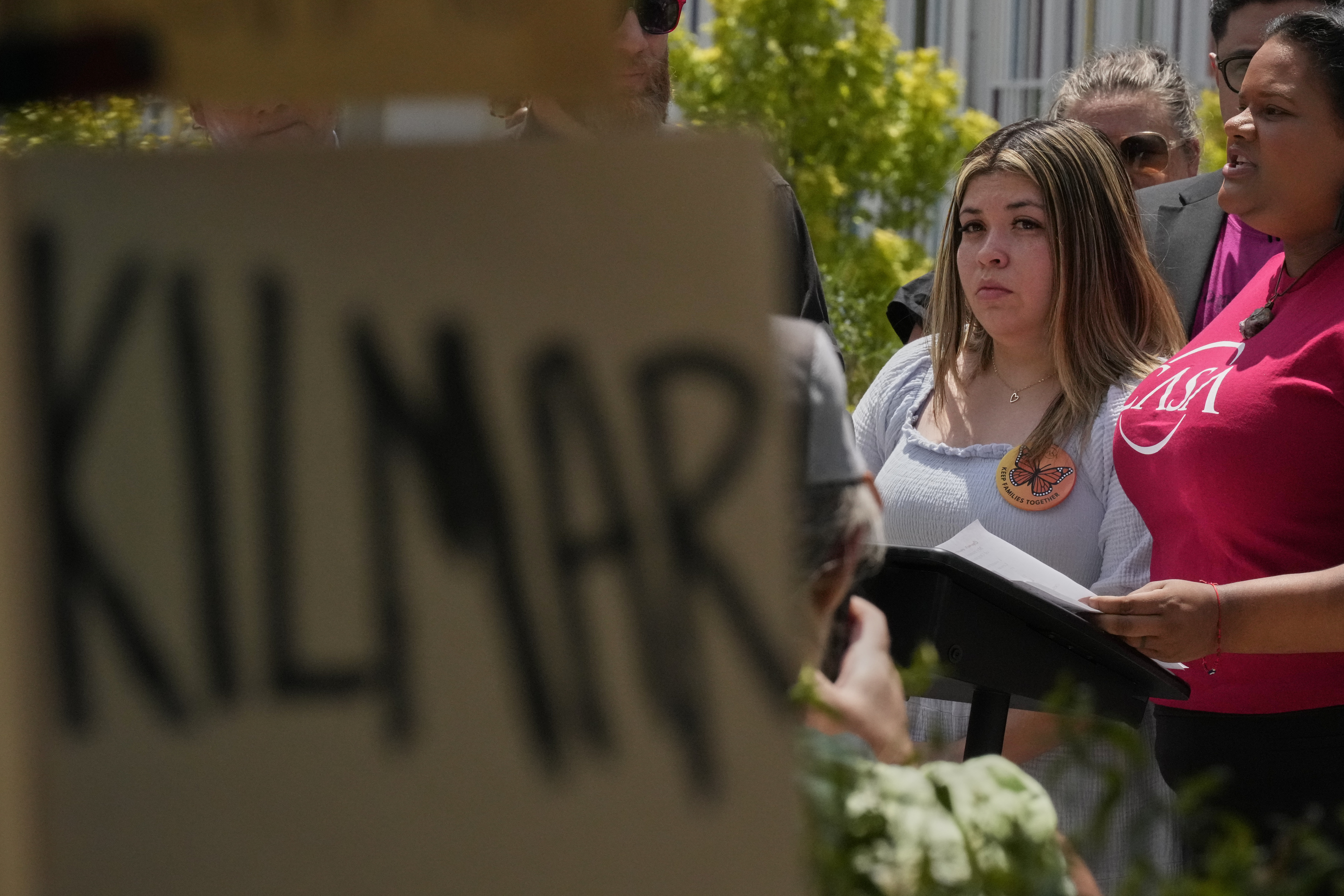 Jennifer Vasquez Sura, wife of Kilmar Abrego Garcia, second right, attends a news conference outside the federal courthouse Wednesday, July 16, 2025, in Nashville, Tenn. (AP Photo/George Walker IV)